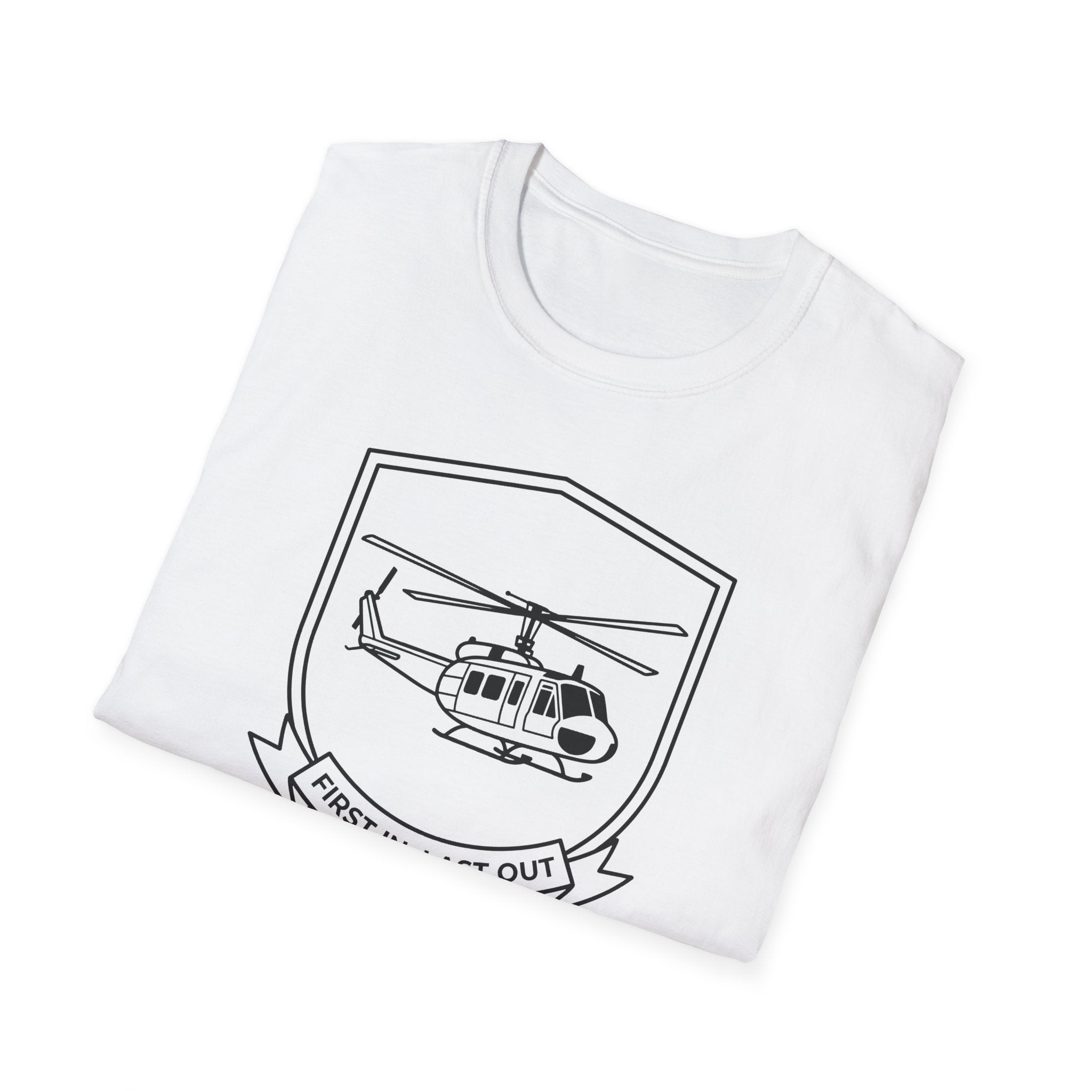 White T-shirt with large black helicopter shield graphic and ribbon text “First In, Last Out”.
