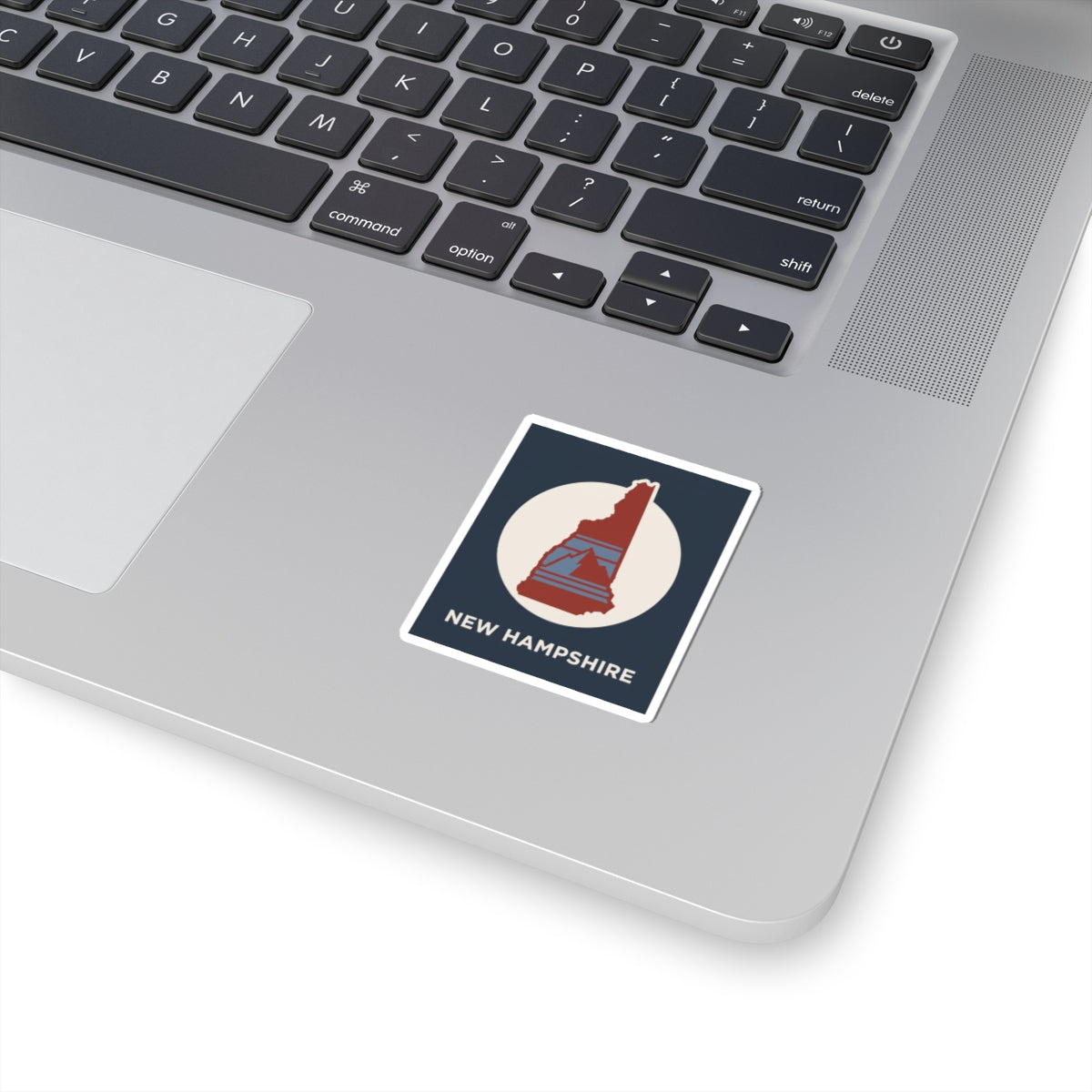 Square New Hampshire state silhouette sticker with red map and blue mountains graphic