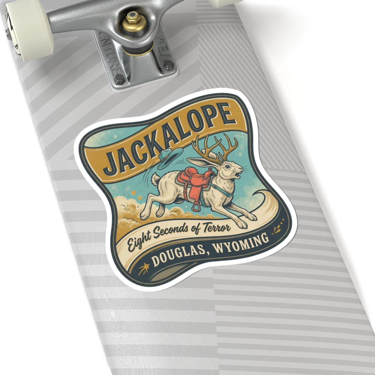 Jackalope sticker on a gray striped surface with “Eight Seconds of Terror” and “Douglas, Wyoming”