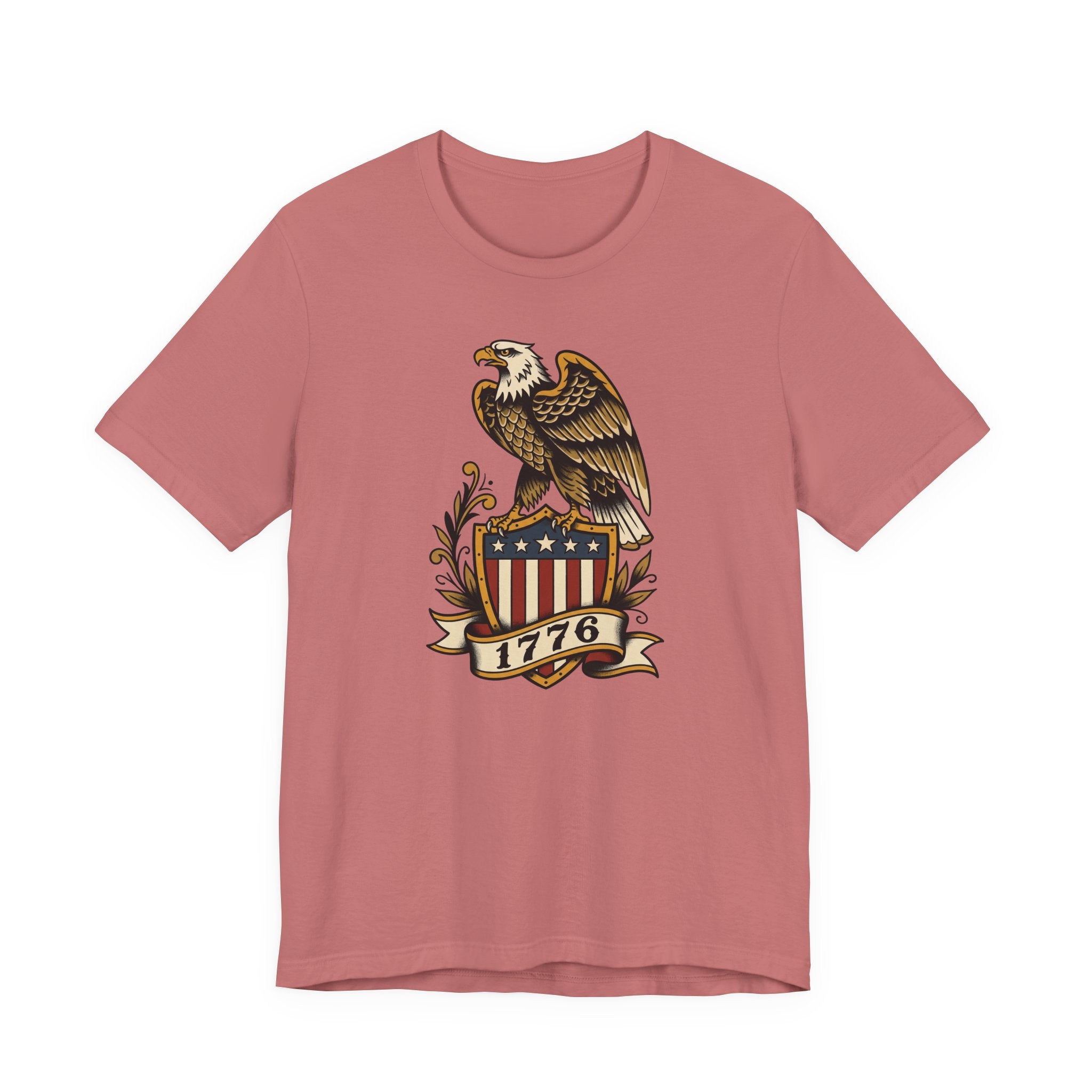 Dusty rose t-shirt with eagle shield graphic and banner reading 1776