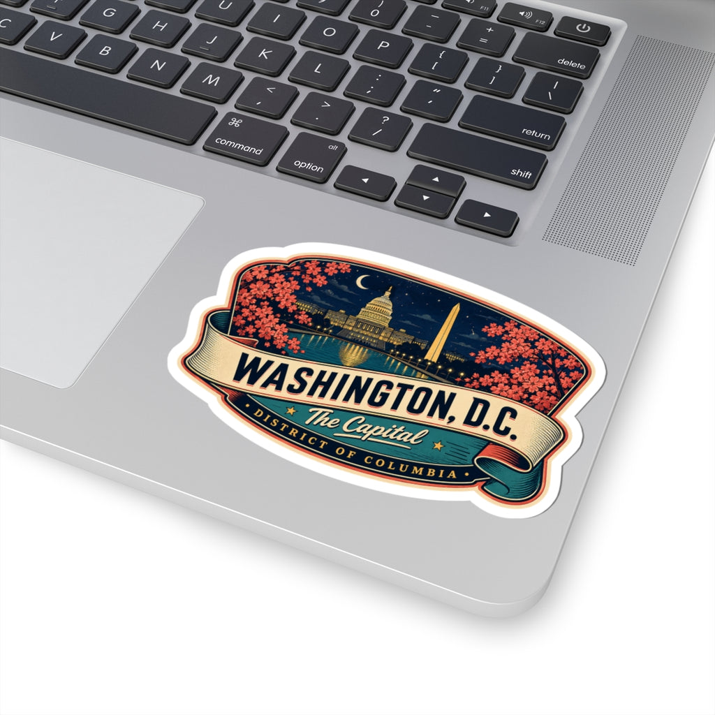 Luggage tag sticker on a laptop with Washington D.C. skyline, pink blossoms, and The Capitol