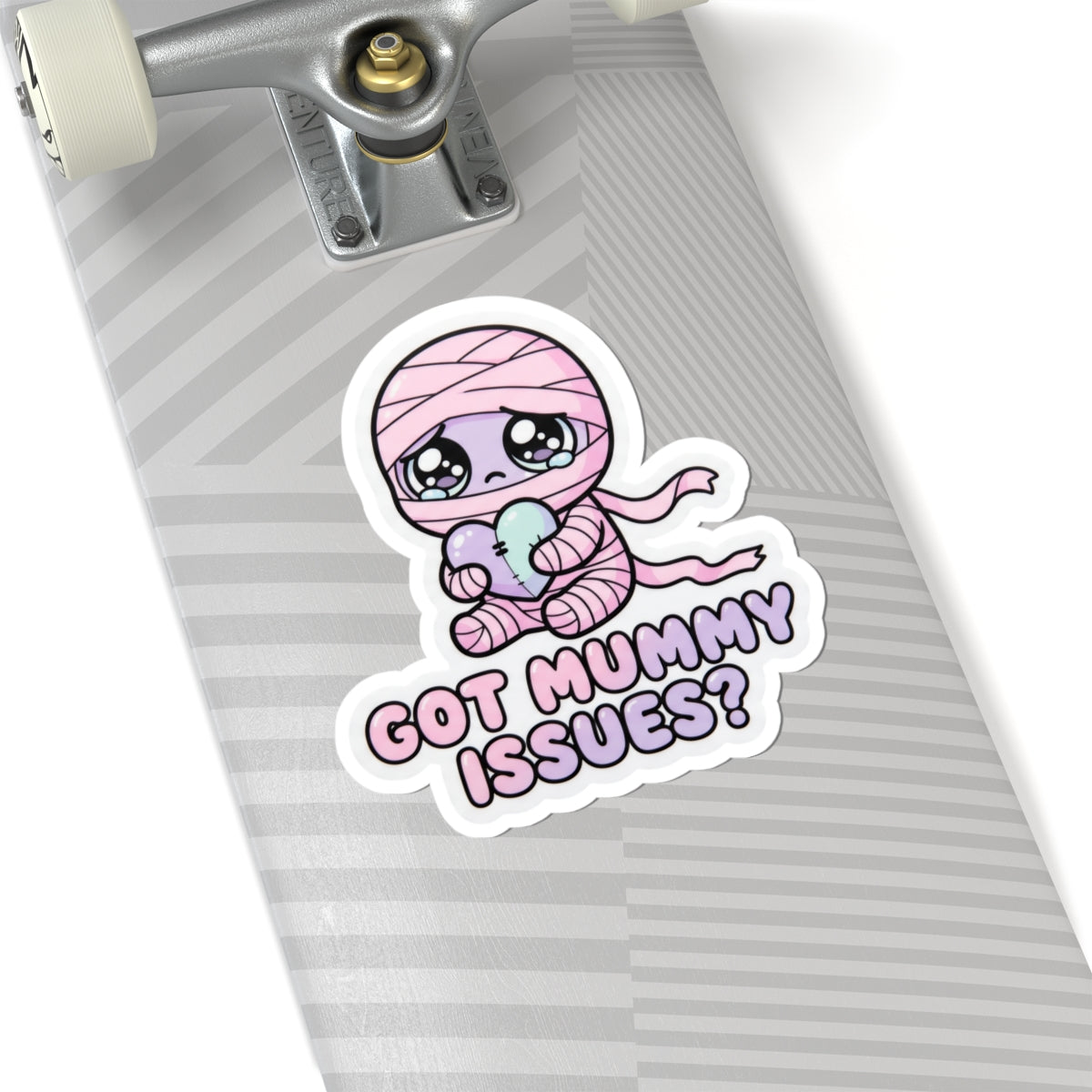 Baby mummy holding heart sticker with pink hood, “GOT MUMMY ISSUES?” text