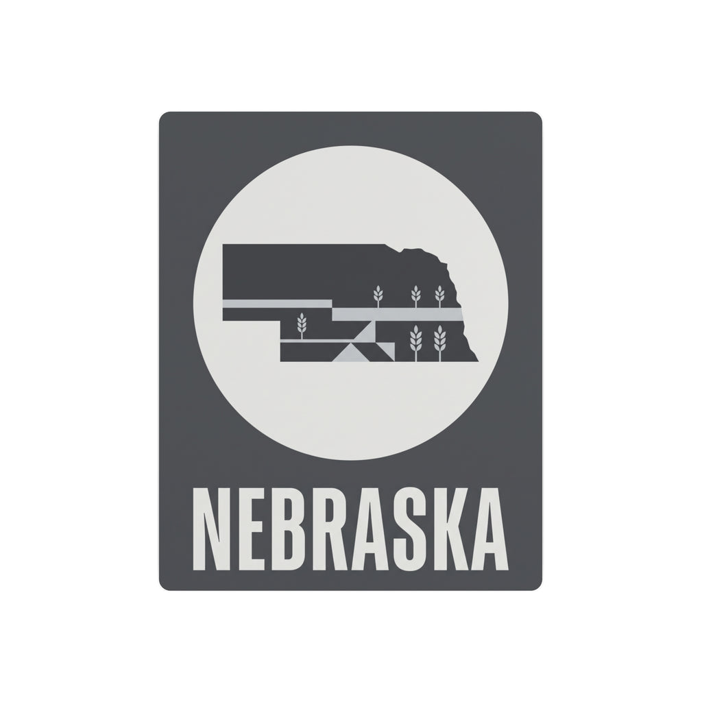 Nebraska metal art sign with dark square frame, circular wheat graphic, and NEBRASKA text