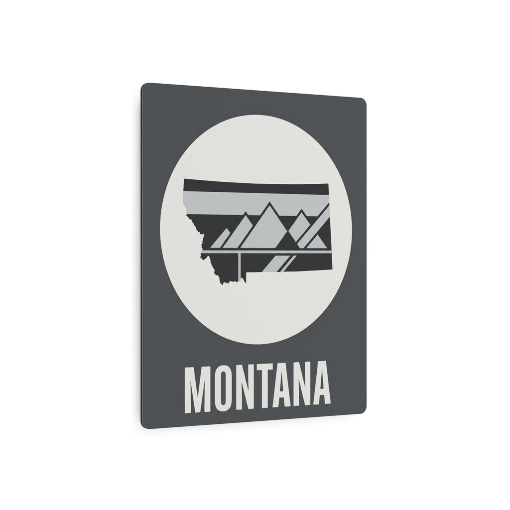 Montana state metal art sign, dark gray with oval circle mountain graphic and “MONTANA” text