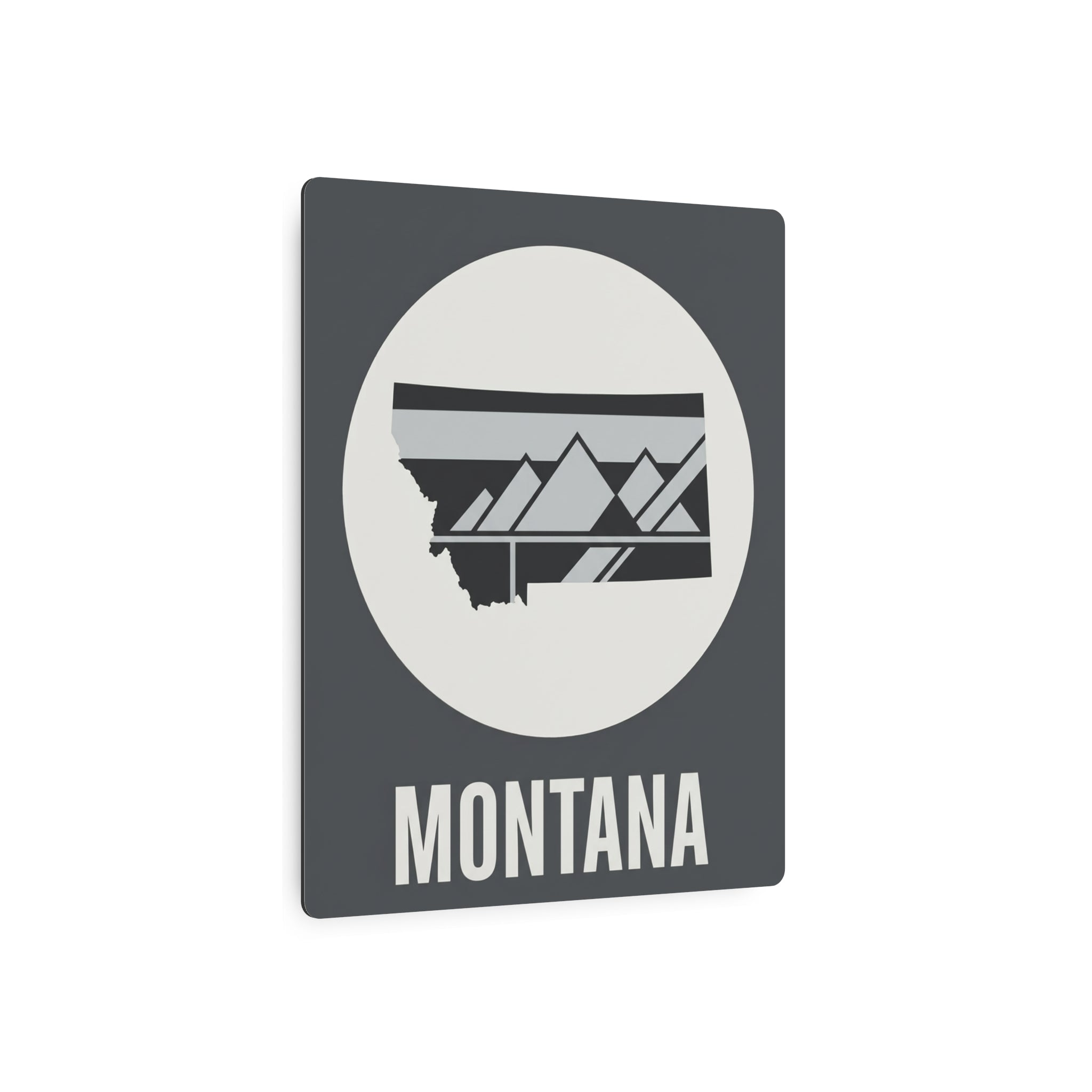 Montana state metal art sign, dark gray with oval circle mountain graphic and “MONTANA” text