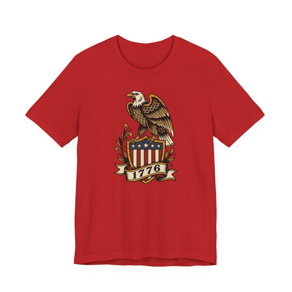 Graphic T-shirt, red, front features gold eagle and 1776 shield logo.