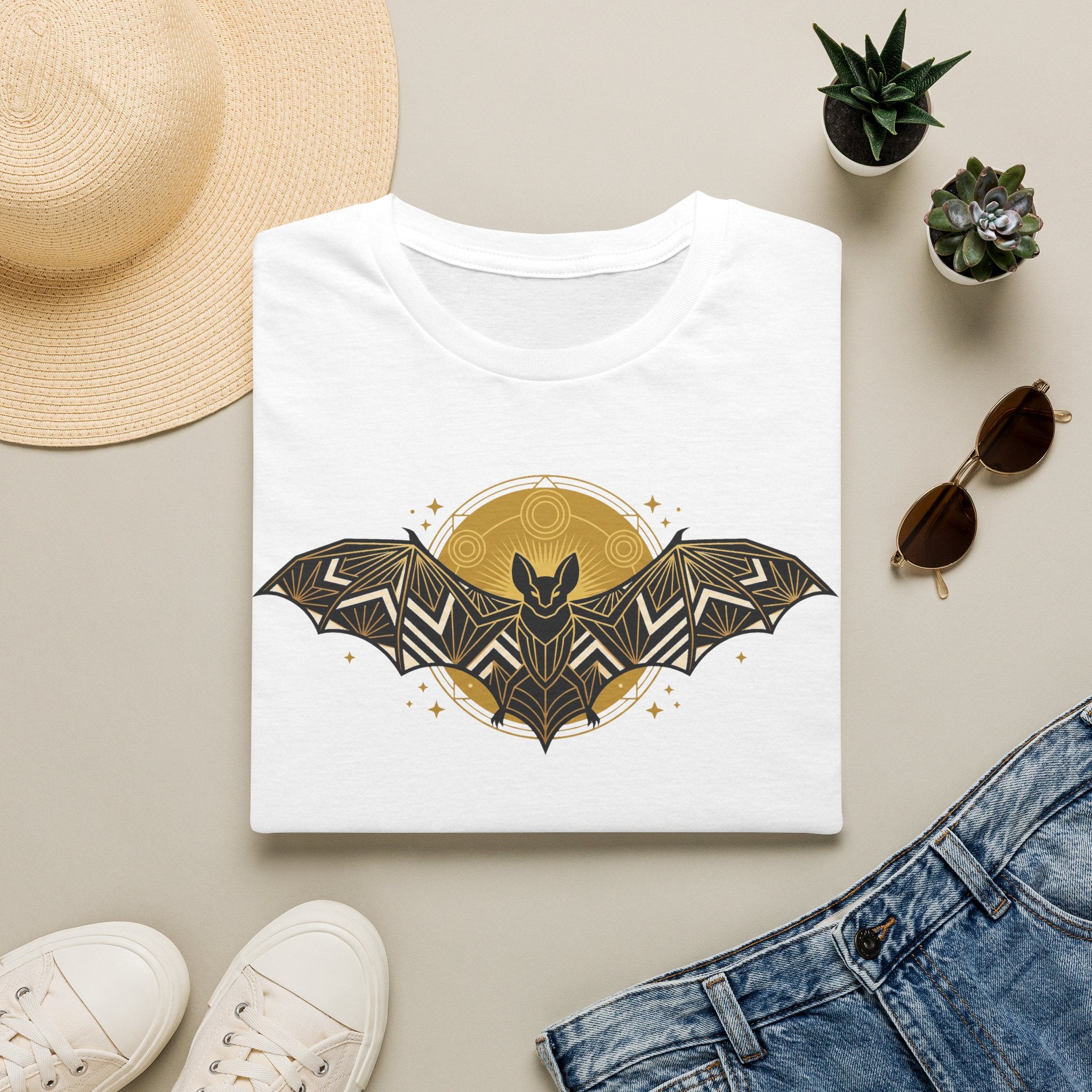 White T-shirt with gold geometric bat and moon graphic