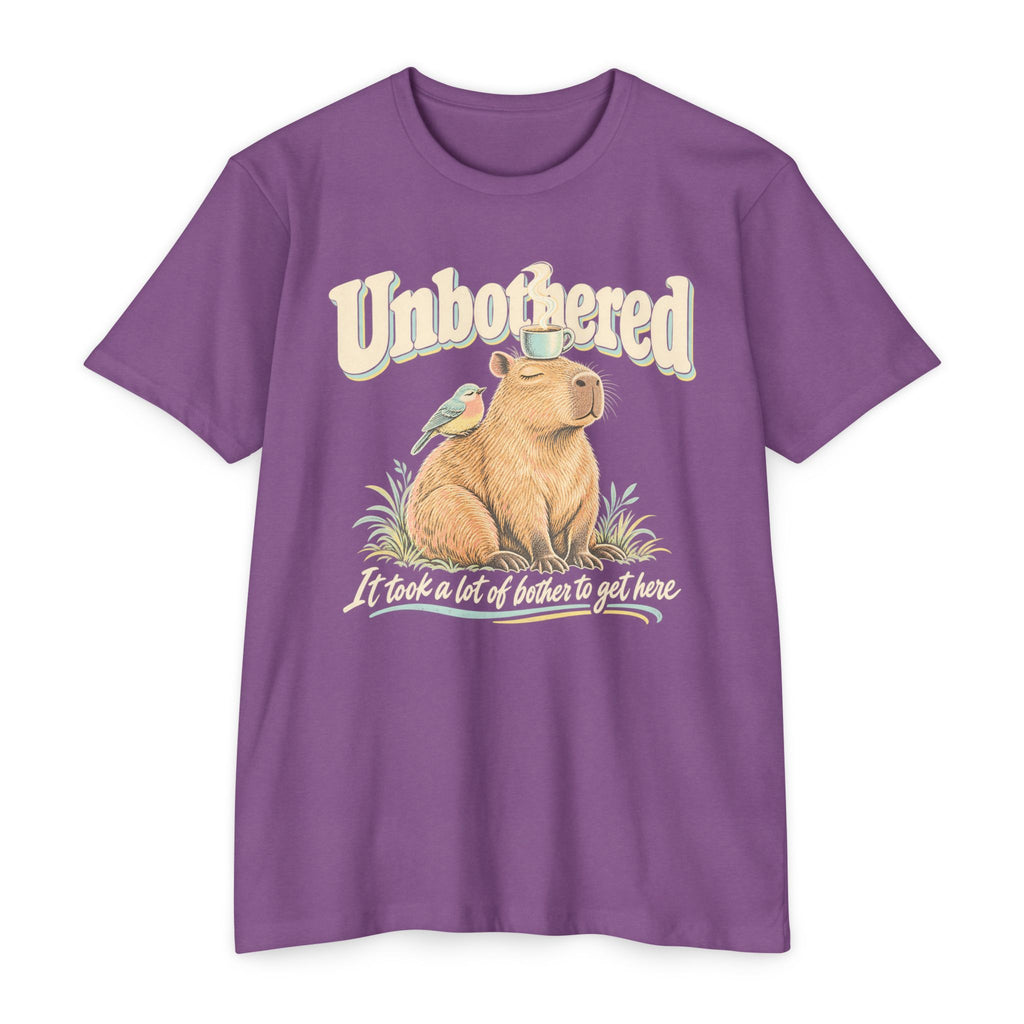 Lavender purple T-shirt with unbothered capybara holding a coffee cup graphic