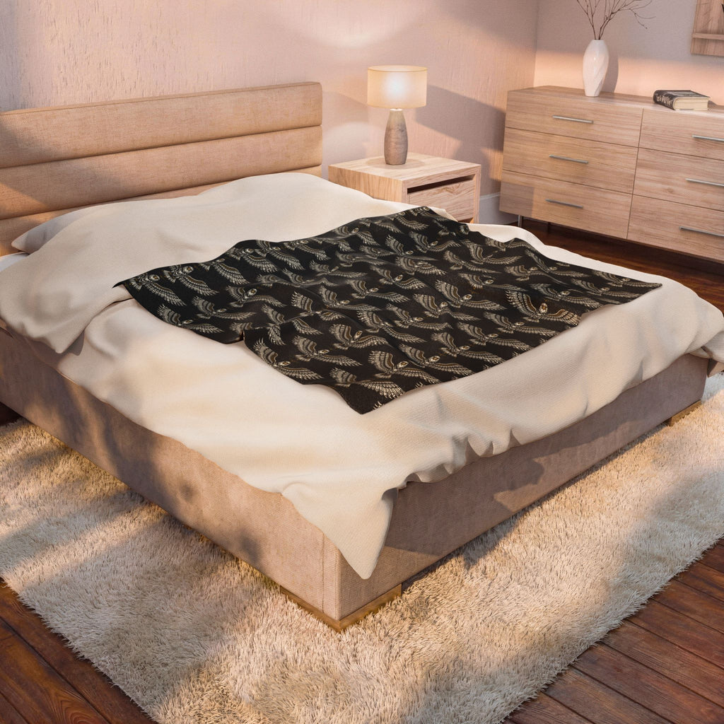Velveteen plush blanket with winged skull wings motif, gold print on dark velvet