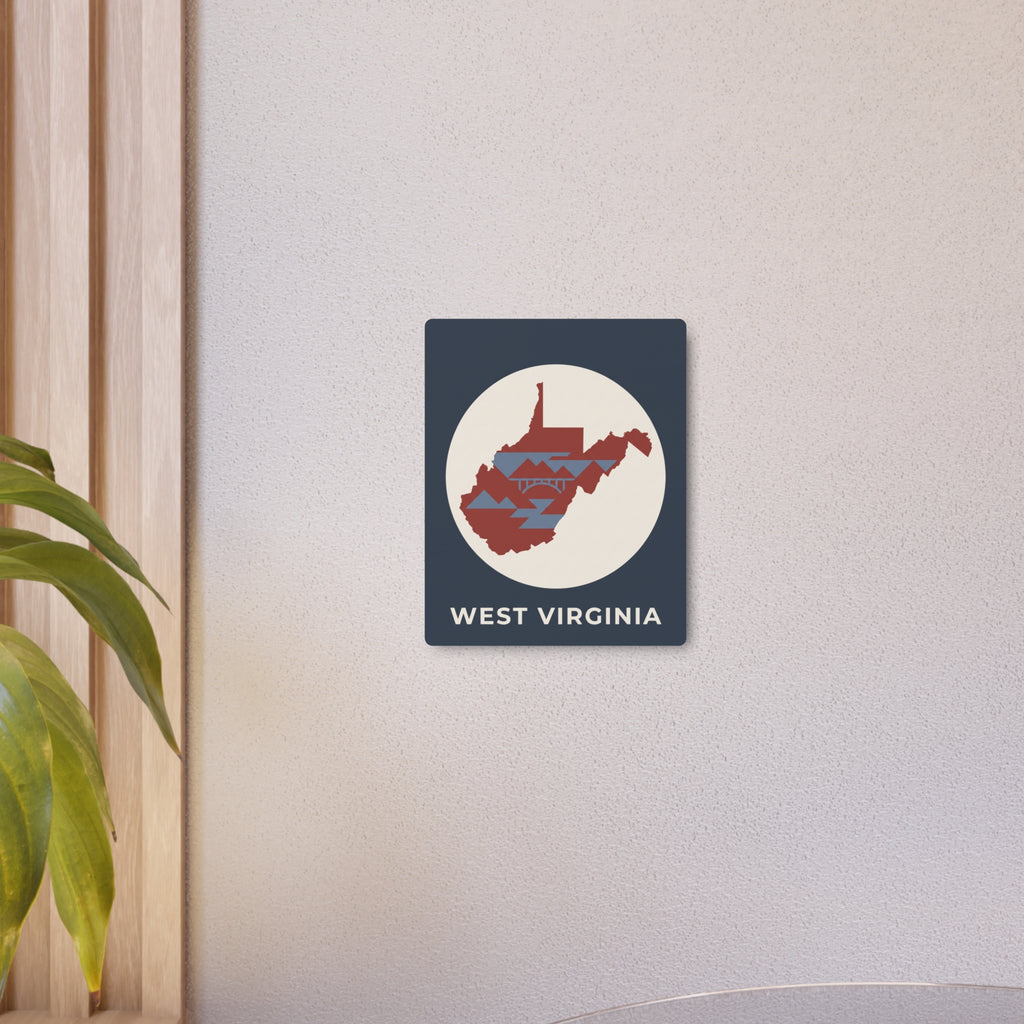 Square metal wall sign showing circular red/blue West Virginia map and 'WEST VIRGINIA' text.