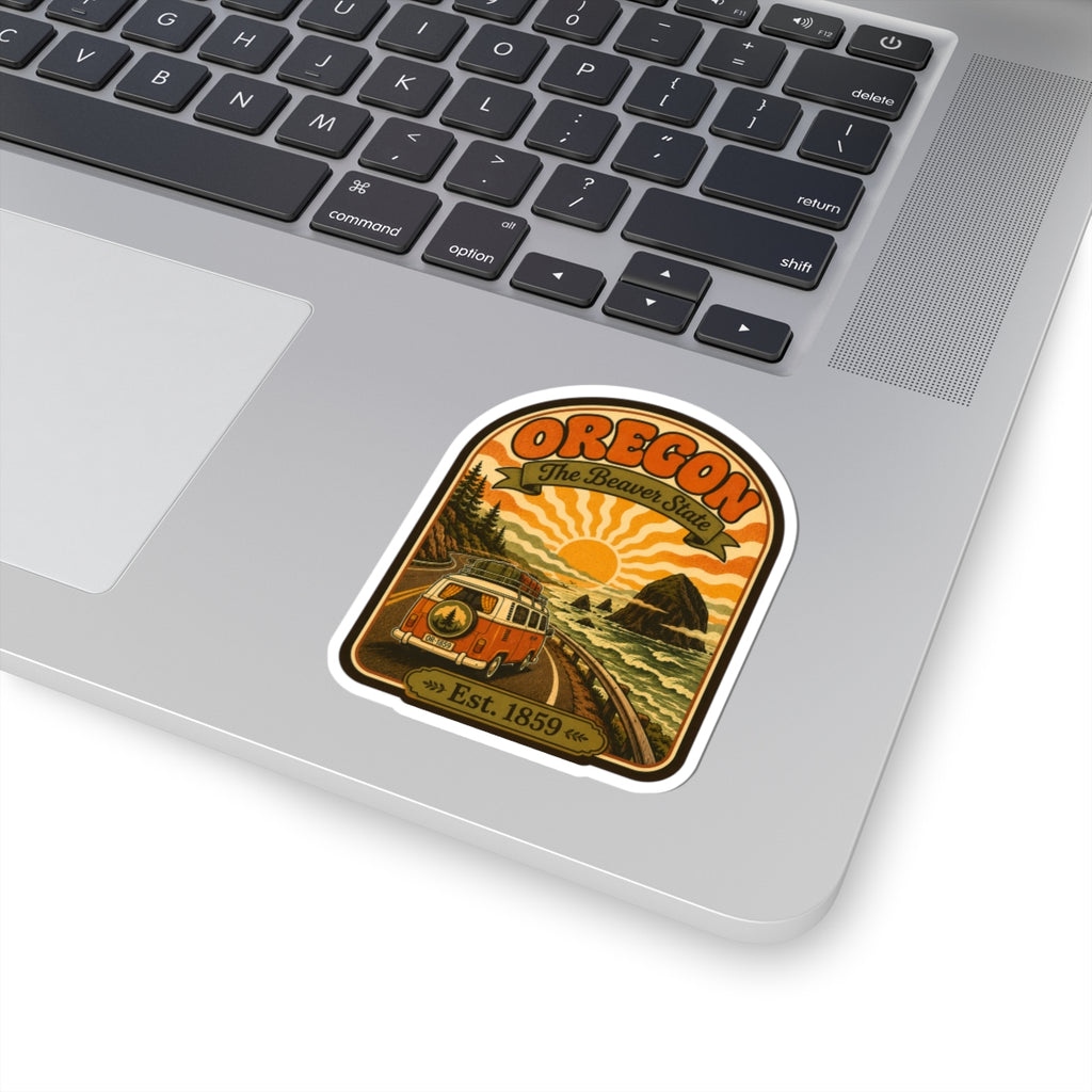 Oregon travel sticker on a laptop keyboard, featuring retro van and Est. 1859