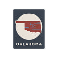 Oklahoma metal art sign with circular state silhouette, oil rig icon, and “OKLAHOMA” text
