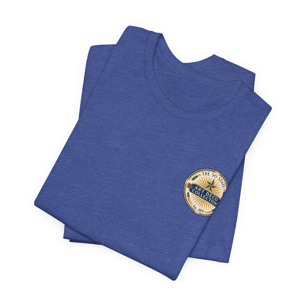 Blue graphic T-shirt with round badge logo; second tee folded behind
