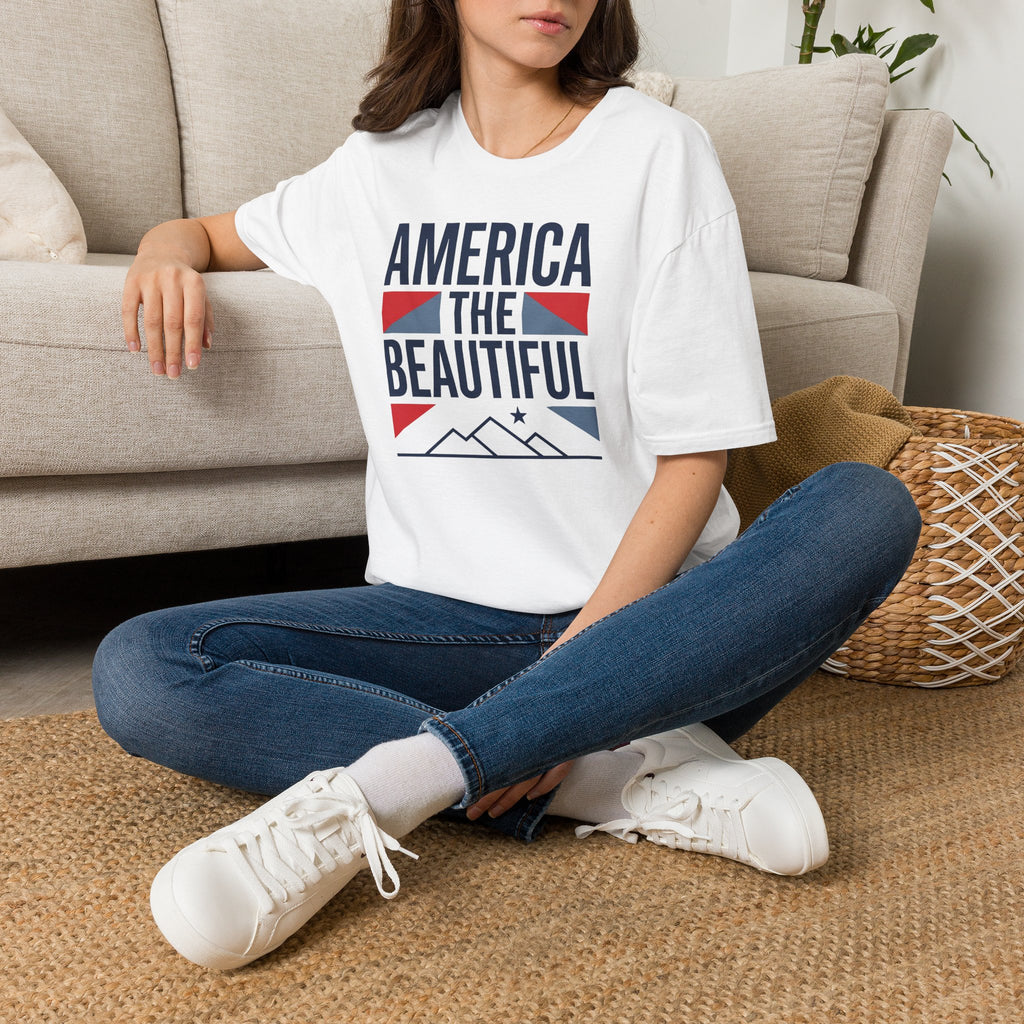White T-shirt worn by model with “America the Beautiful” patriotic graphic