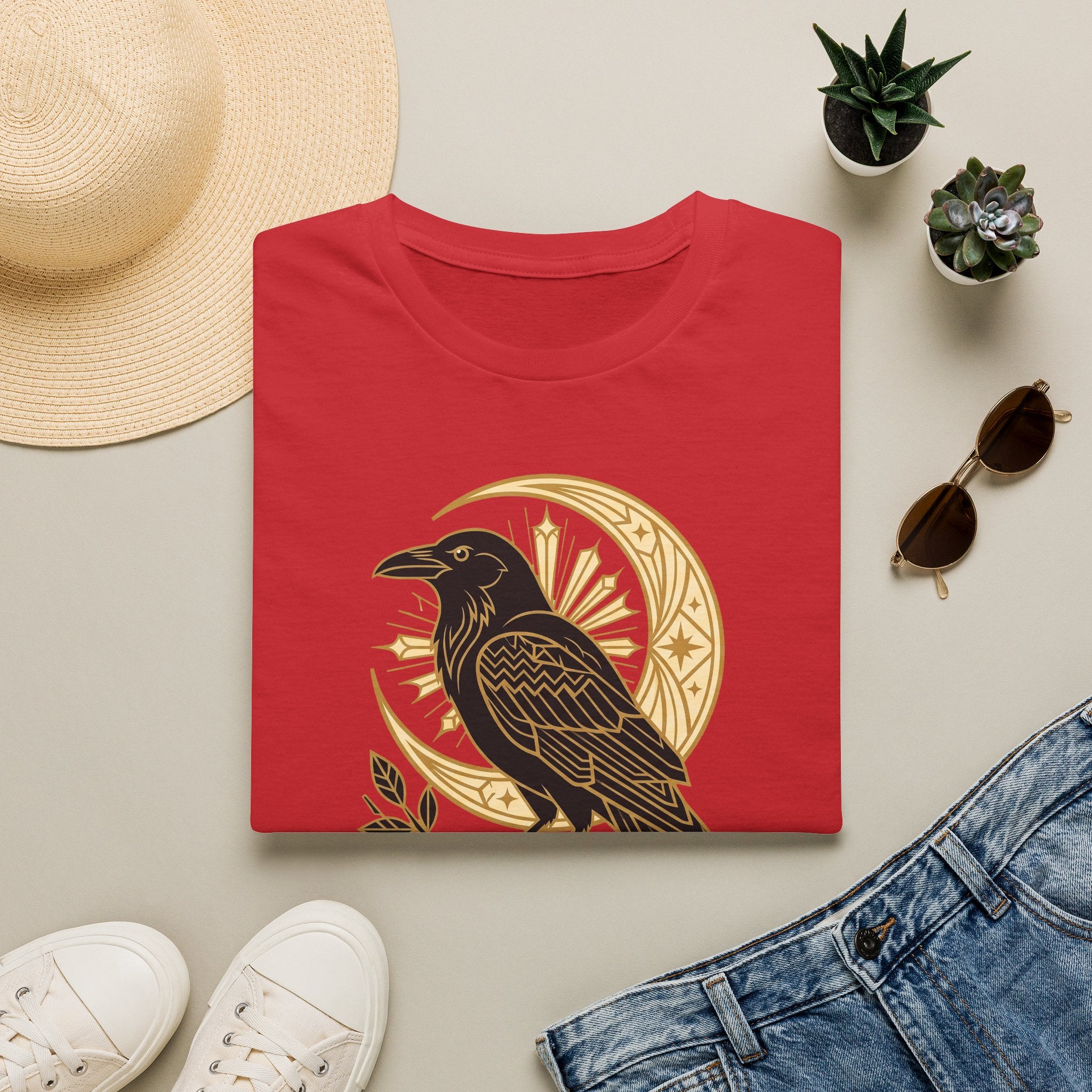 Red crewneck T-shirt with gold raven and moon graphic on front