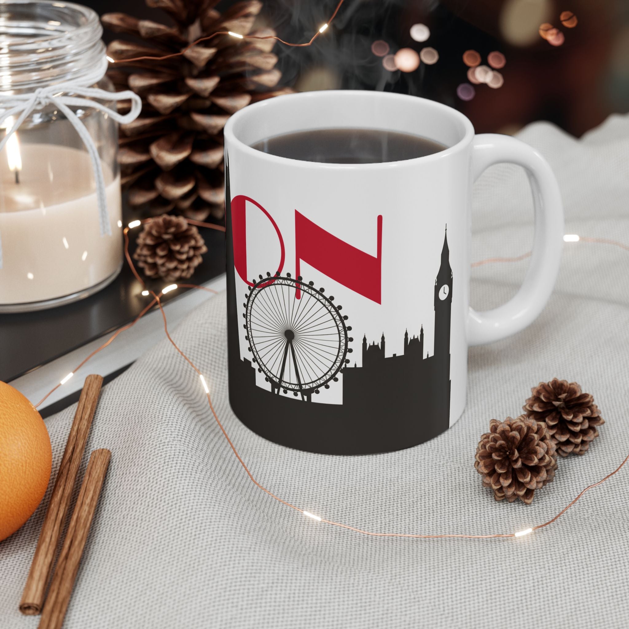 White coffee mug with red and black London skyline print, Ferris wheel detail