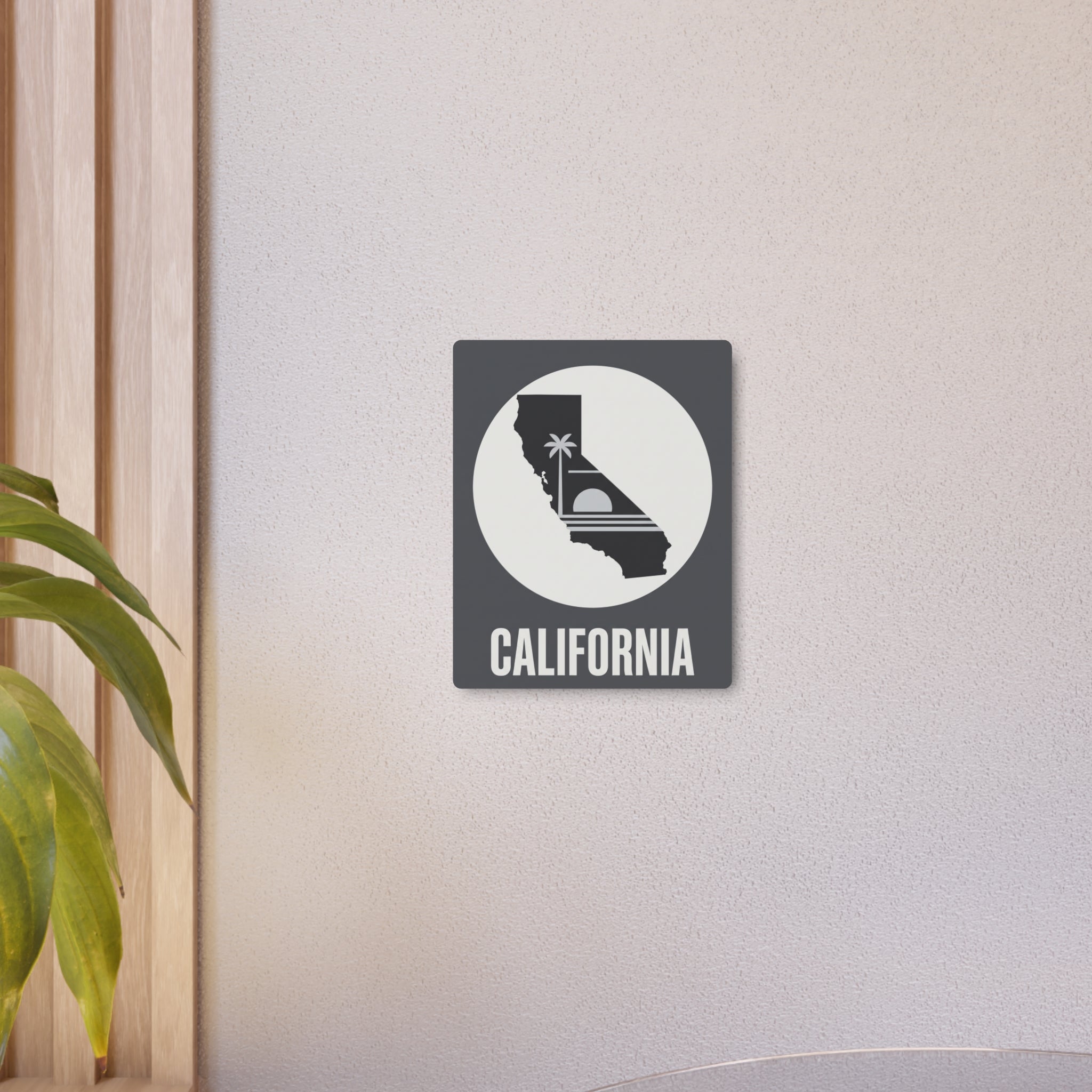 California metal wall sign with circular California silhouette, palm tree and 'CALIFORNIA'