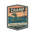 Vintage CHAMP sticker featuring a green sea serpent, lighthouse, and “LAKE CHAMPLAIN” text