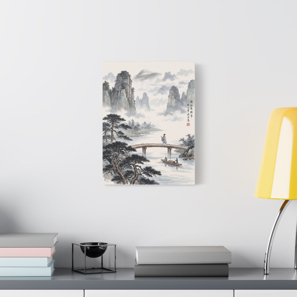 Small framed landscape wall art print on a light wall with misty mountains and river