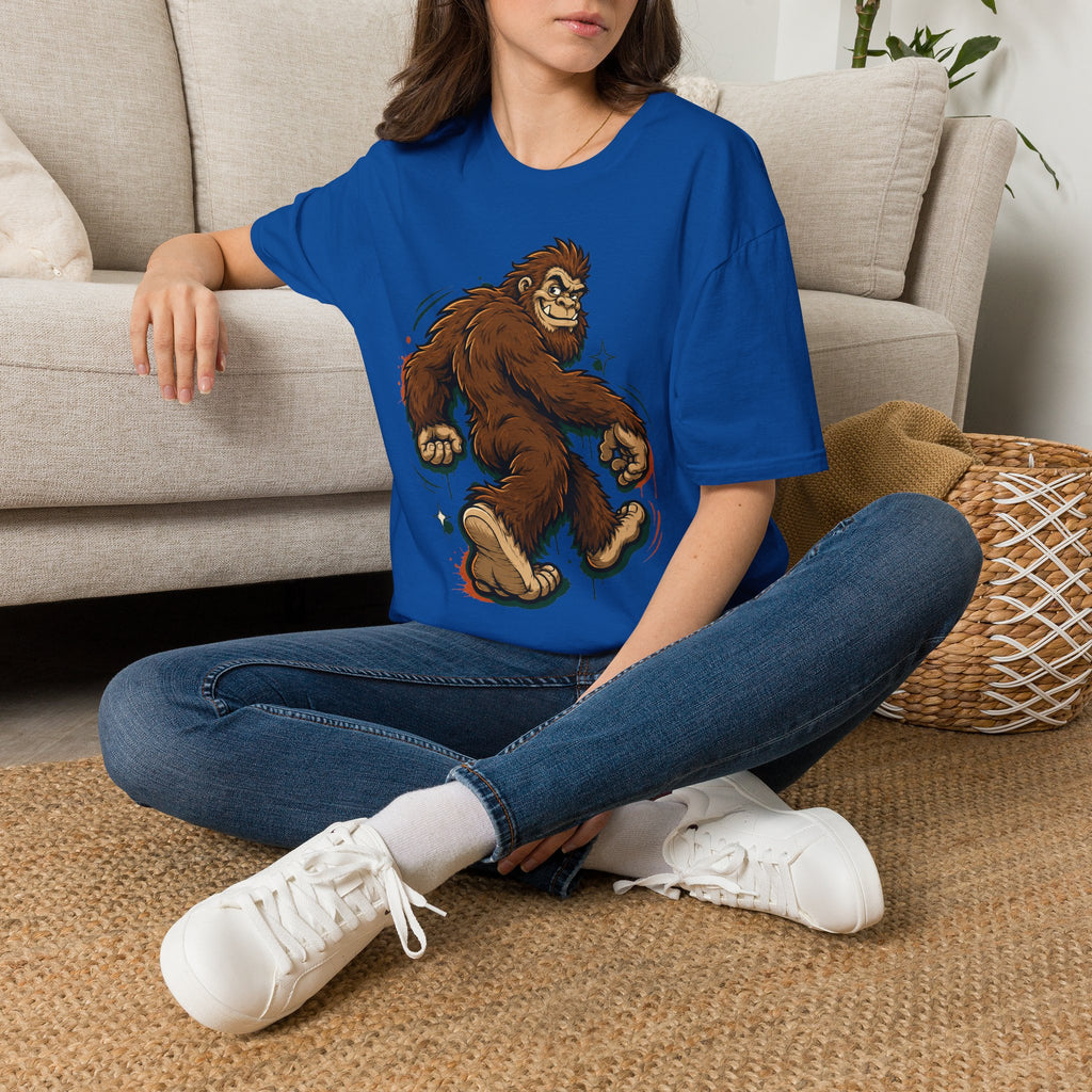 Royal blue sasquatch graphic t-shirt with smirking bigfoot cartoon front