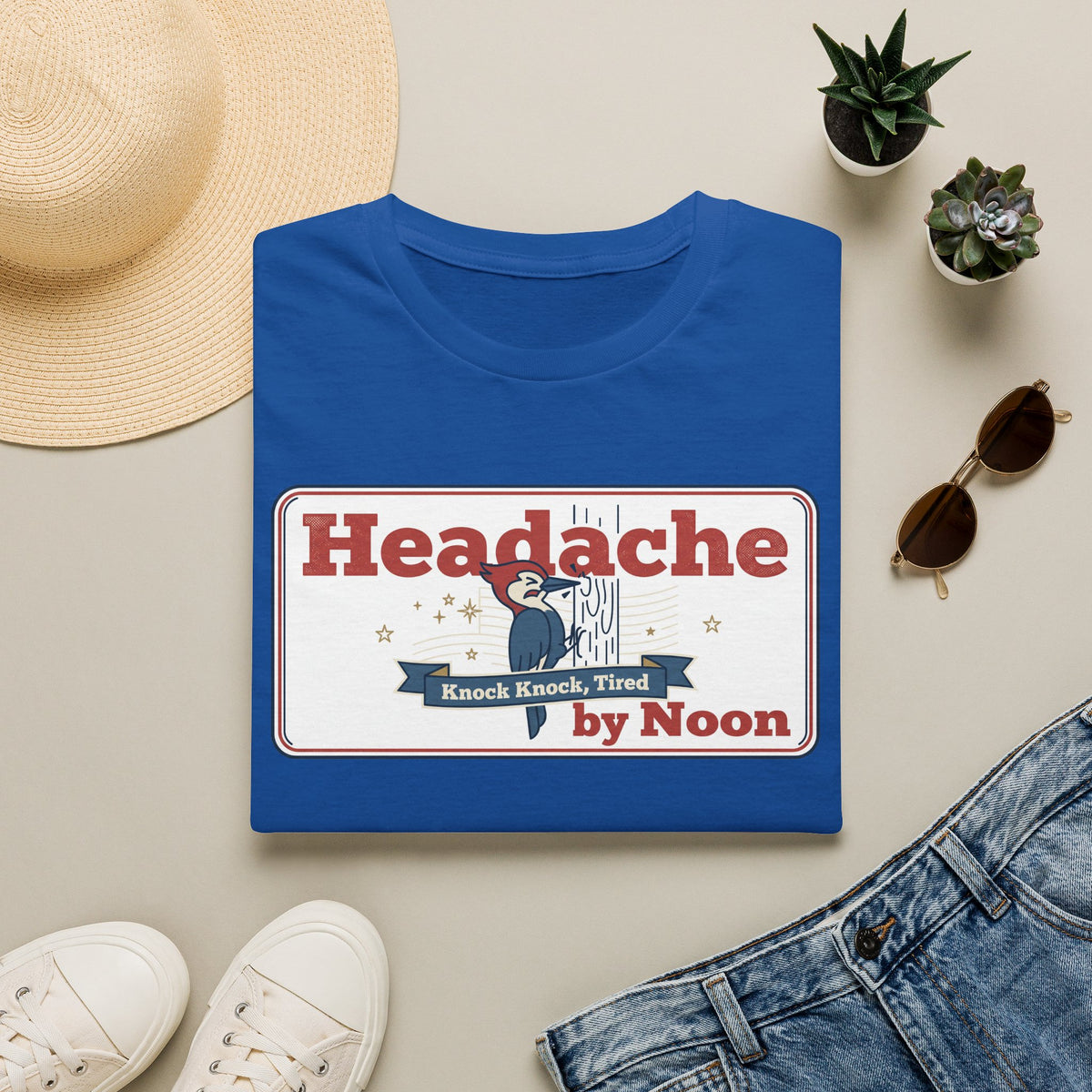 Royal blue crewneck t-shirt with retro "Headache by Noon" nurse design