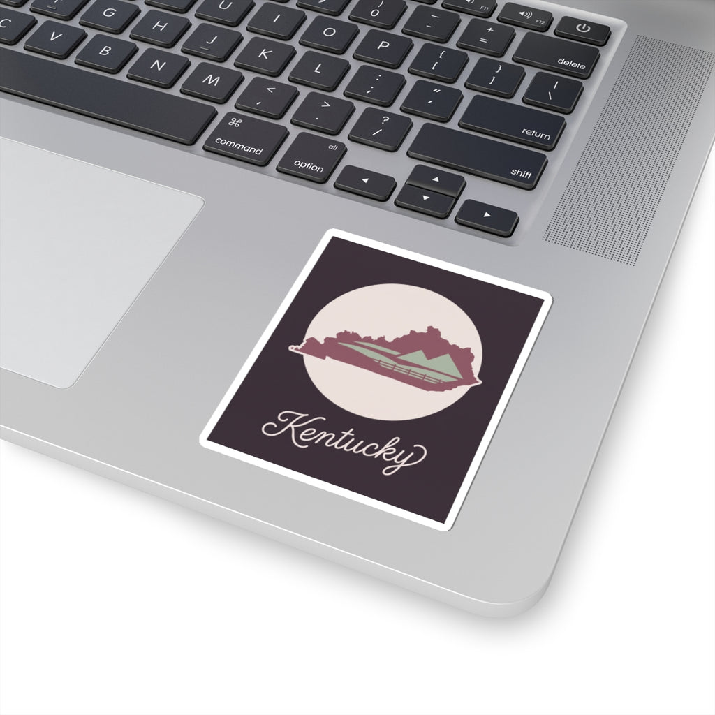 Kentucky silhouette vinyl sticker with white border, mauve state map, and cursive Kentucky script
