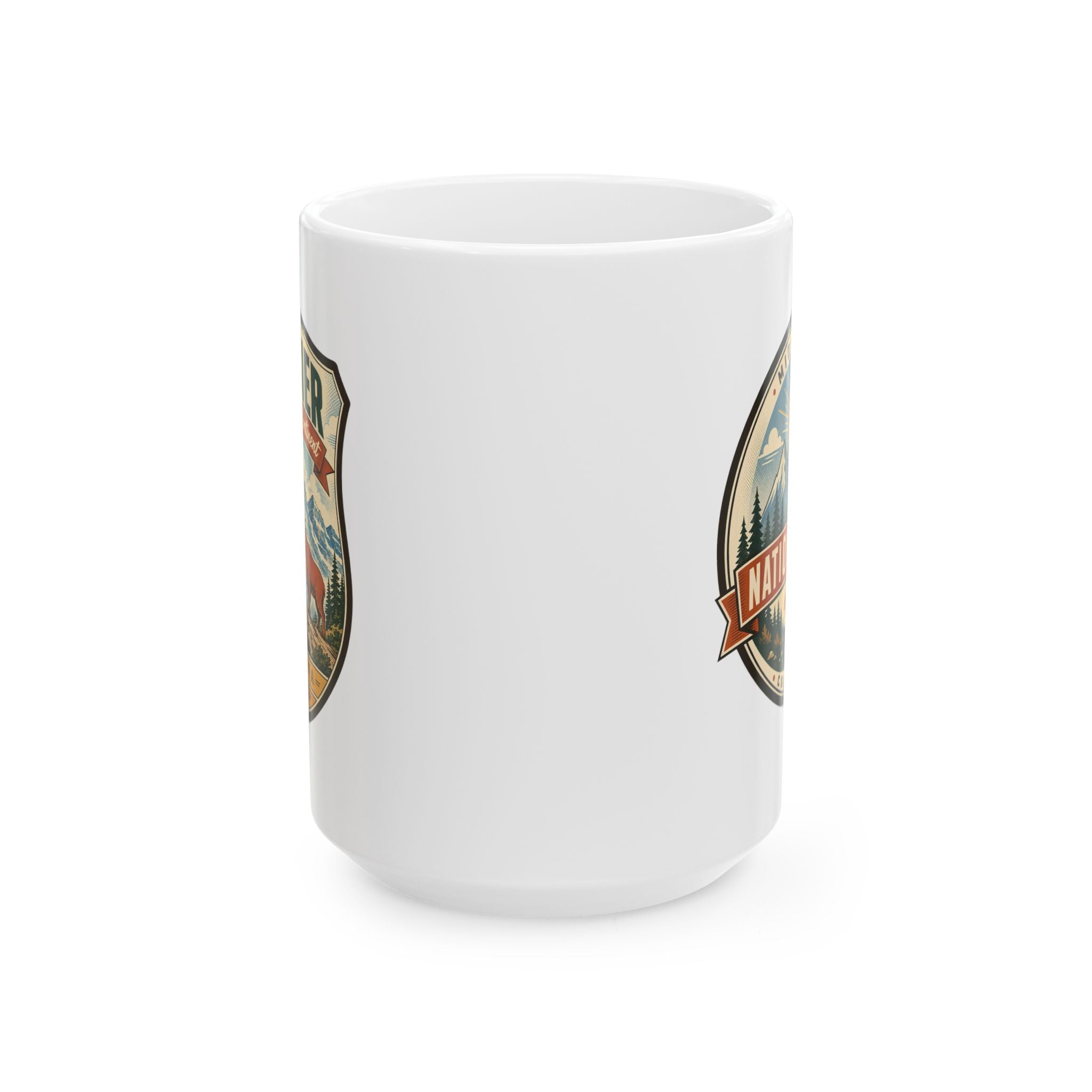 White ceramic mug with partial Glacier badge featuring mountains and bear graphic