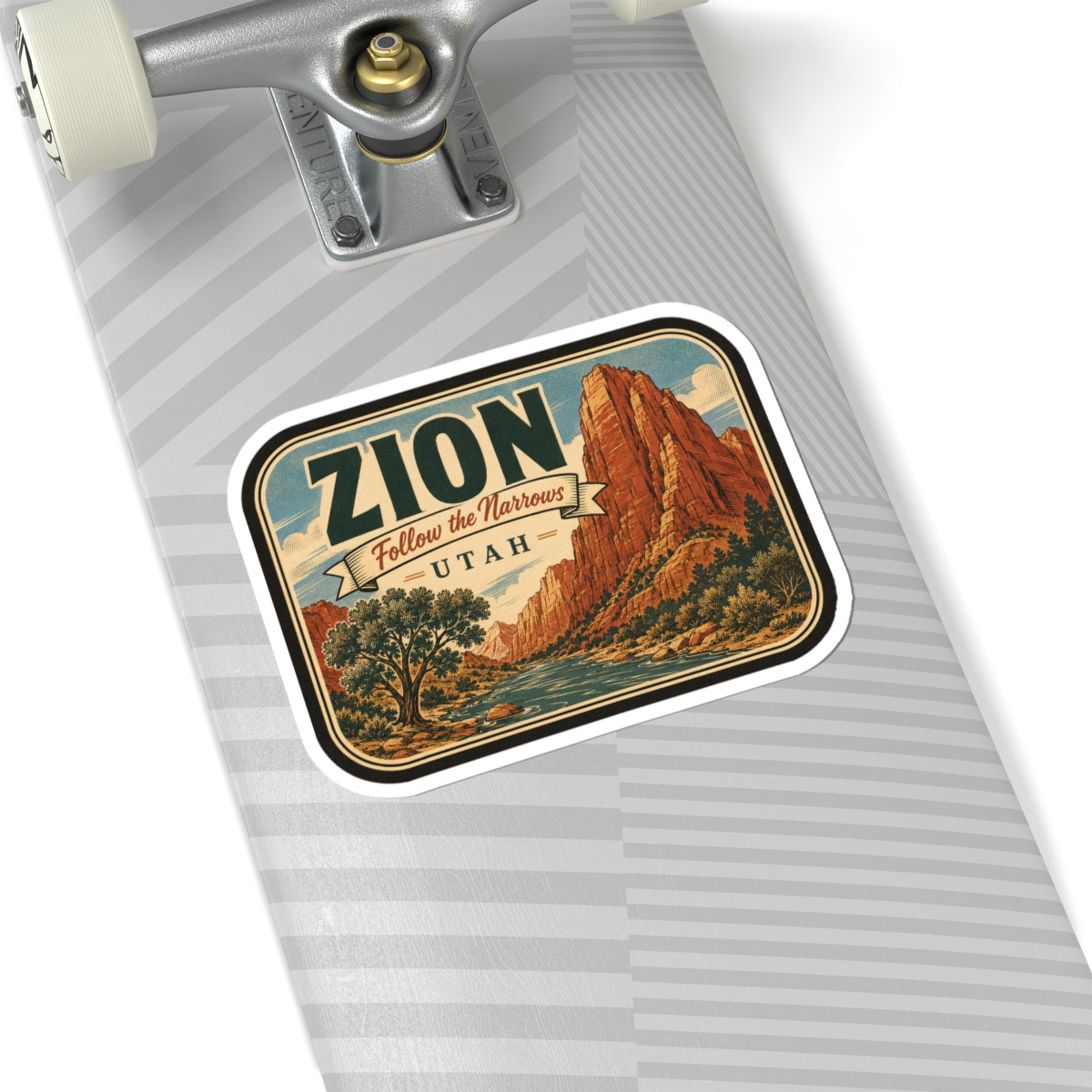 Zion travel sticker on a notebook cover, rounded border with ZION and canyon river scene