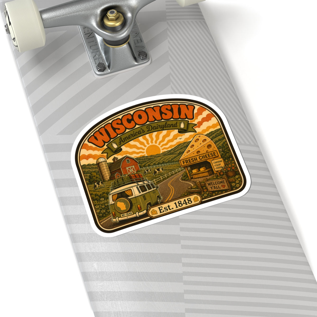 Rounded Wisconsin dairyland sticker with farm road and cheese shop, Est. 1848