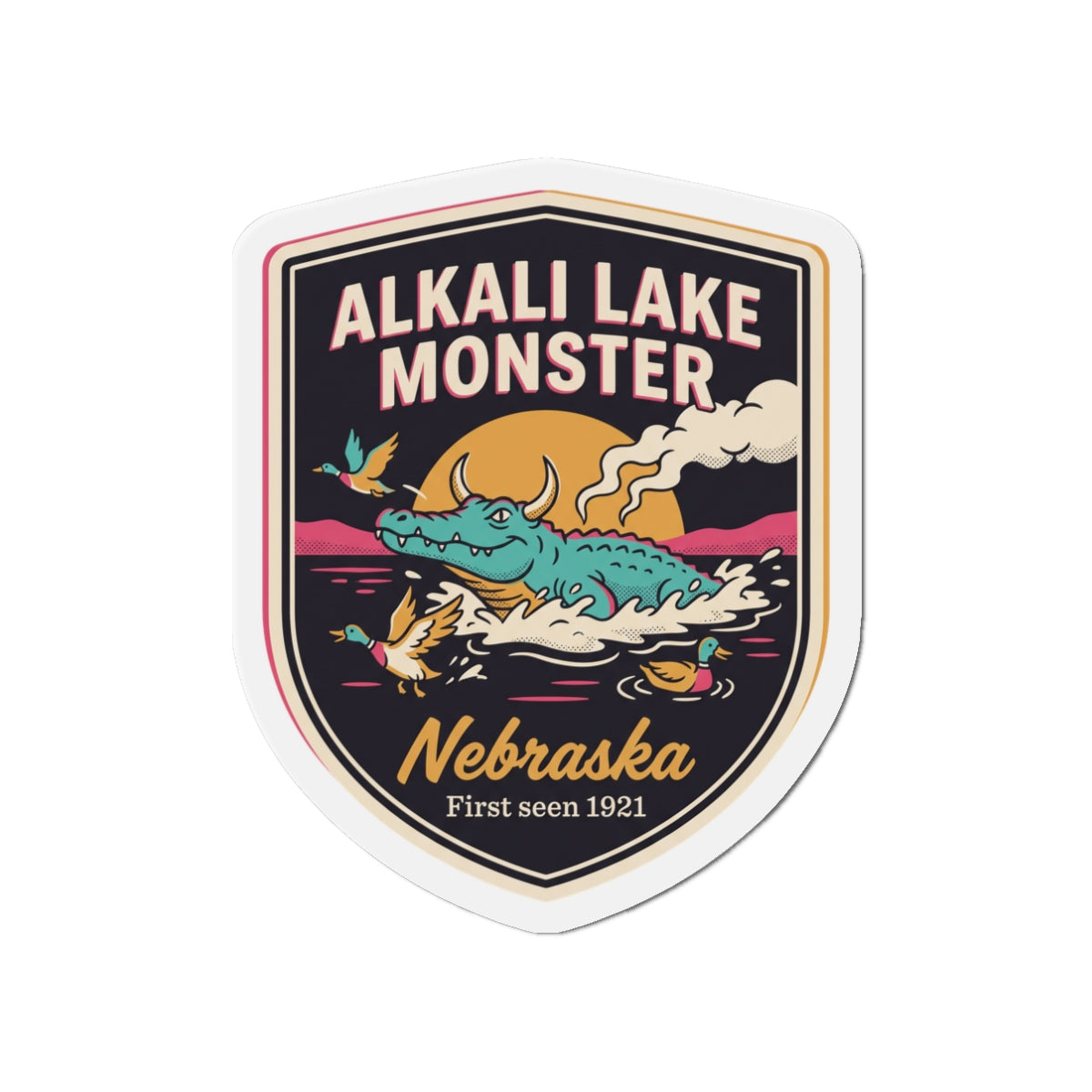 Shield-shaped die-cut magnet featuring the Alkali Lake Monster illustration and “Nebraska”