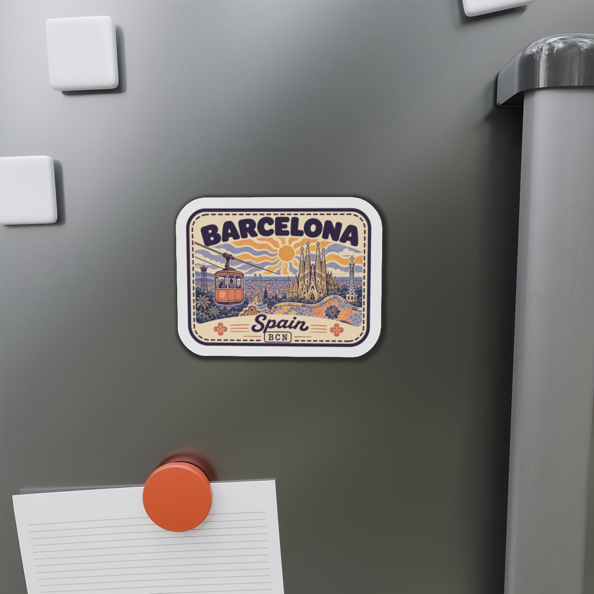 Die-cut Barcelona travel magnet on stainless steel refrigerator door