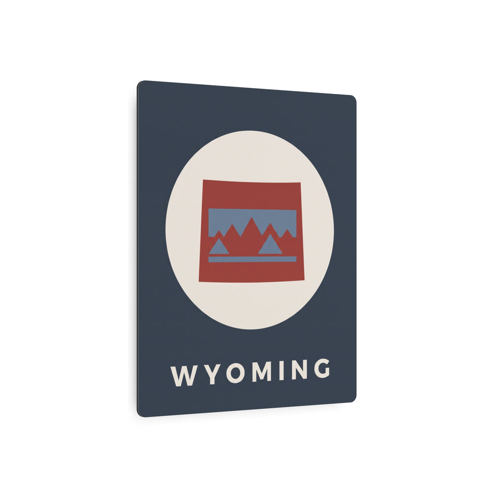 Wyoming state metal art sign, dark blue square with oval mountain icon and “WYOMING” wordmark.
