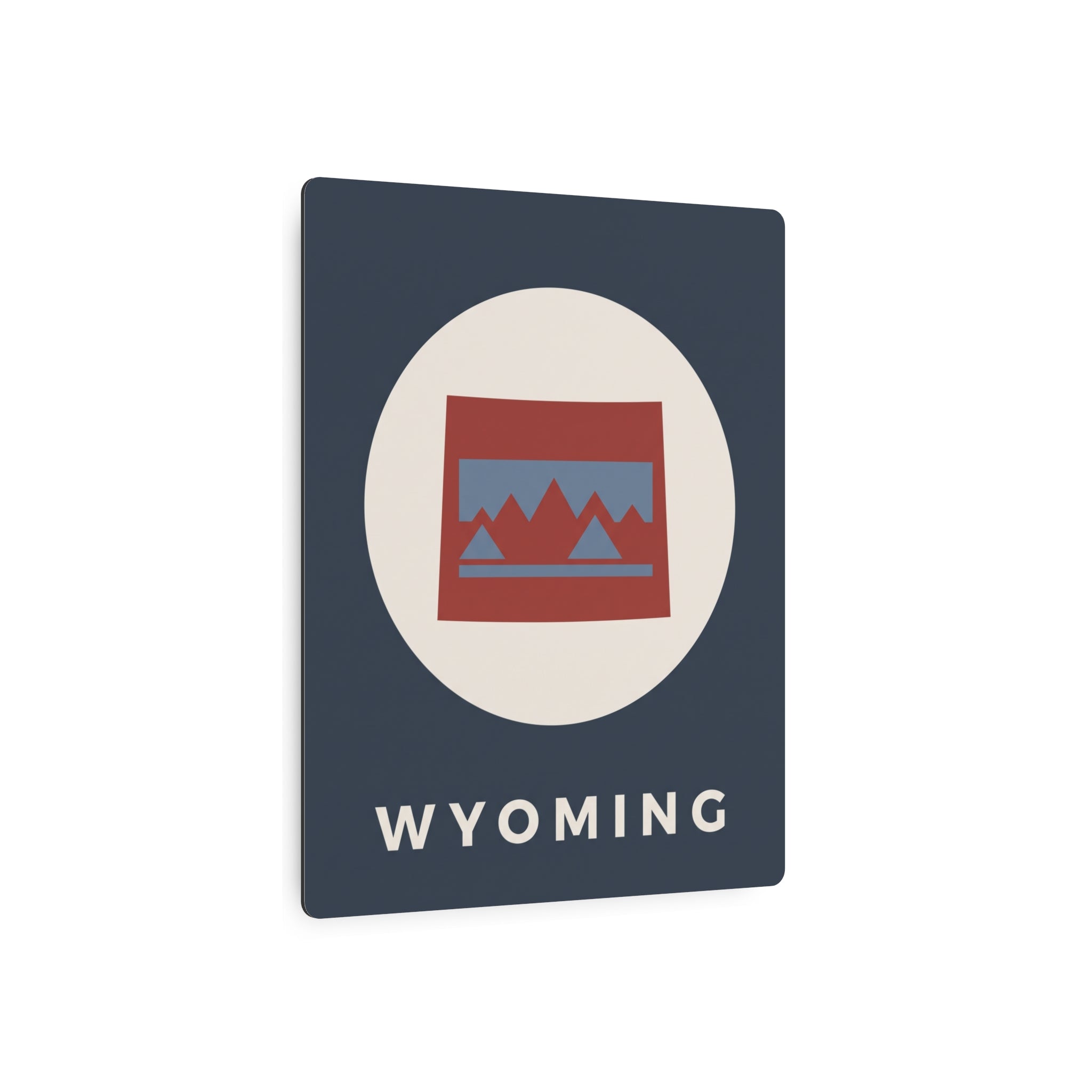 Wyoming state metal art sign, dark blue square with oval mountain icon and “WYOMING” wordmark.