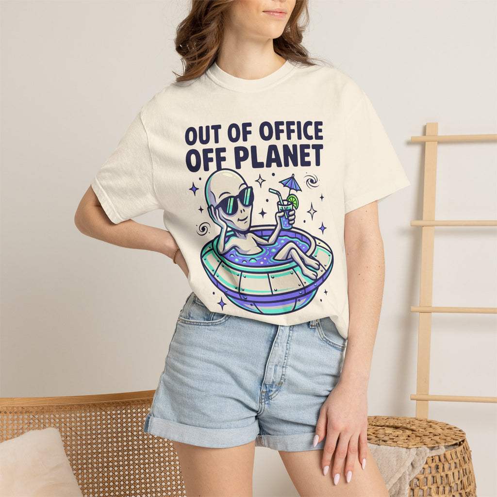 White graphic T-shirt worn by model with alien floatie illustration