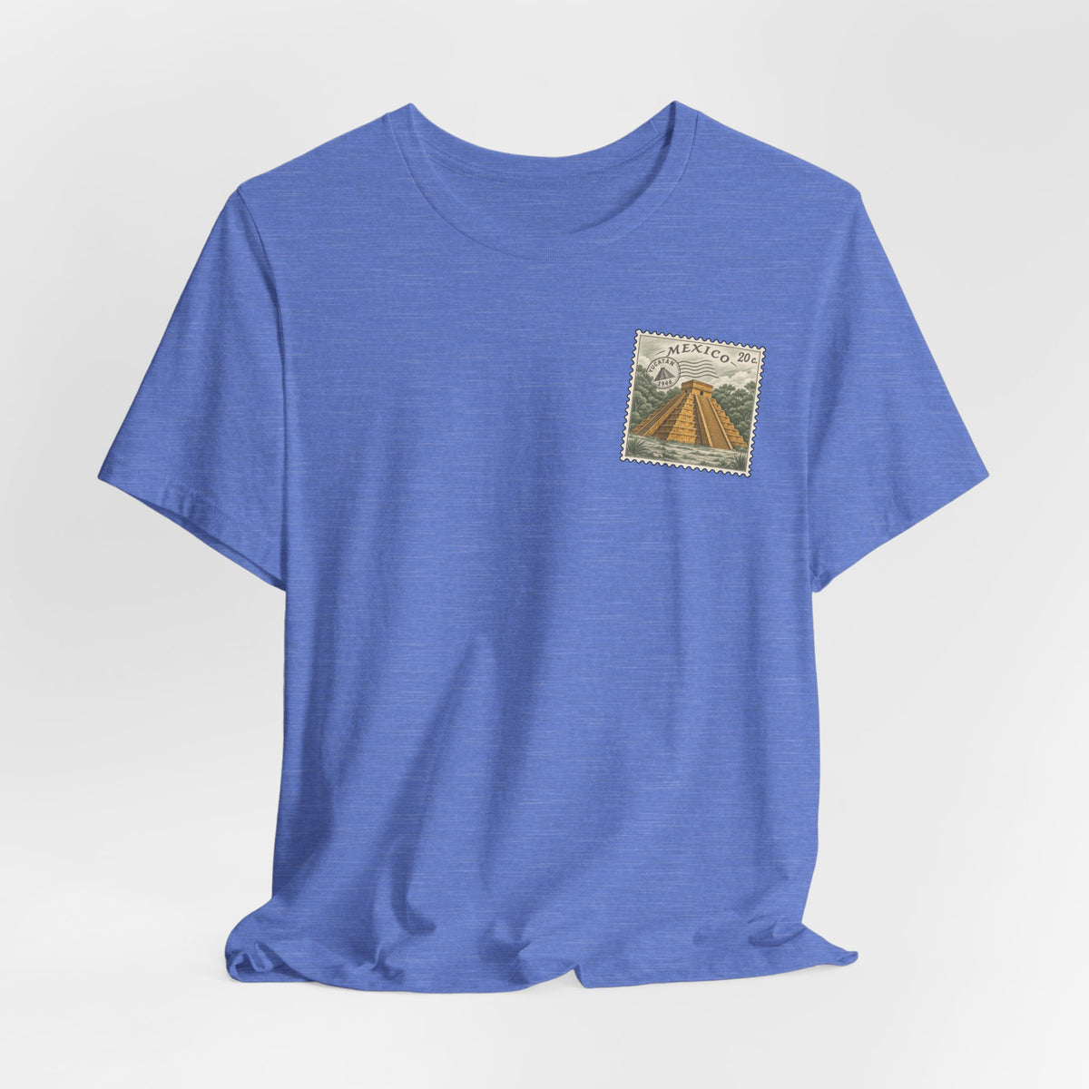 Blue crewneck T-shirt with small Mexico postage stamp graphic on chest