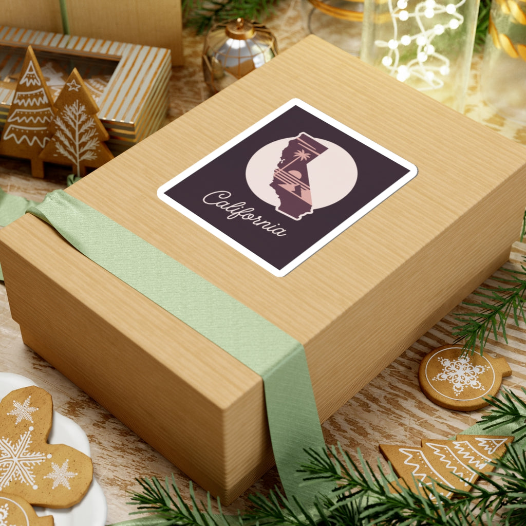 California silhouette sticker on gift wrap, mauve design with “California” script