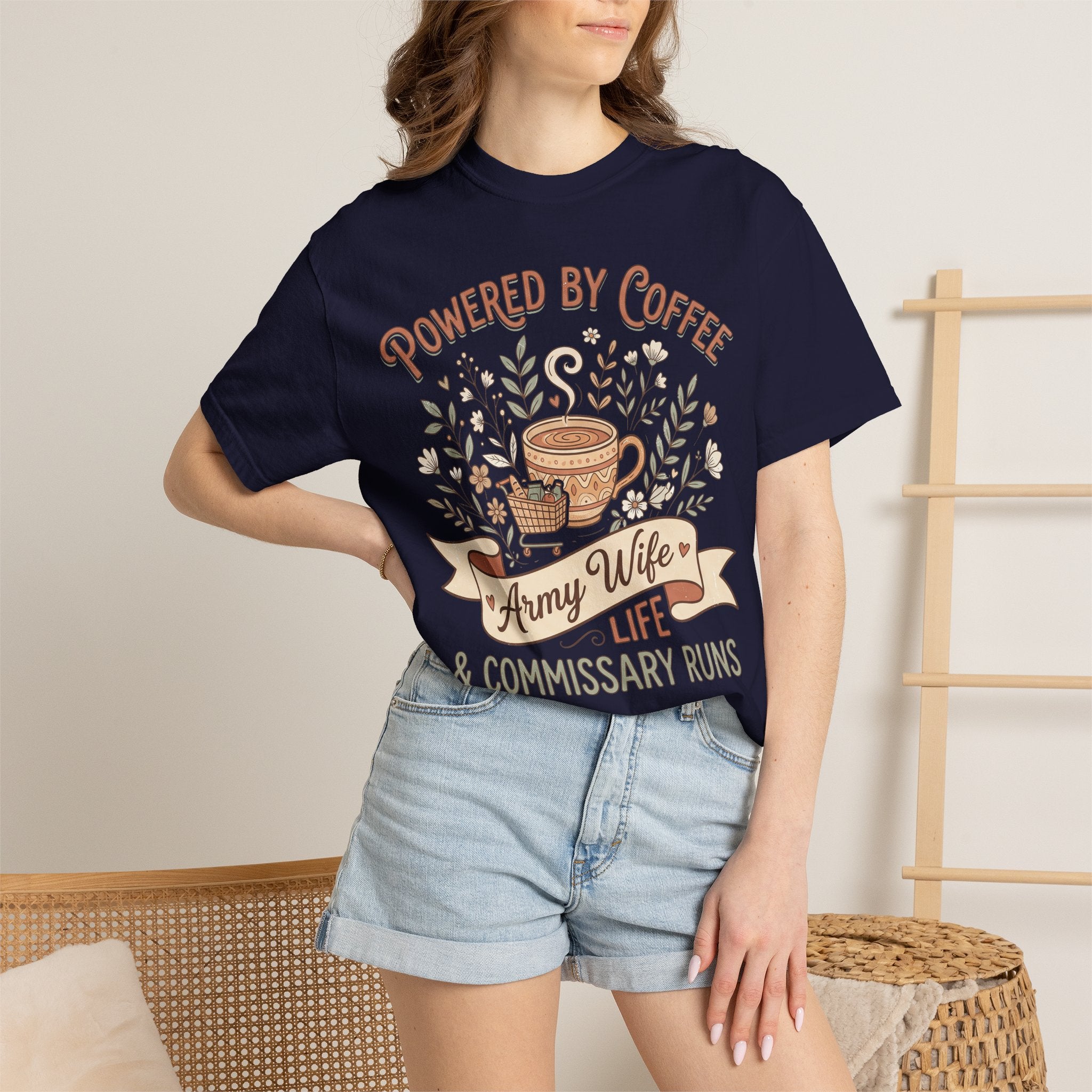 Navy T-shirt on model with "Powered by Coffee" floral coffee cup print