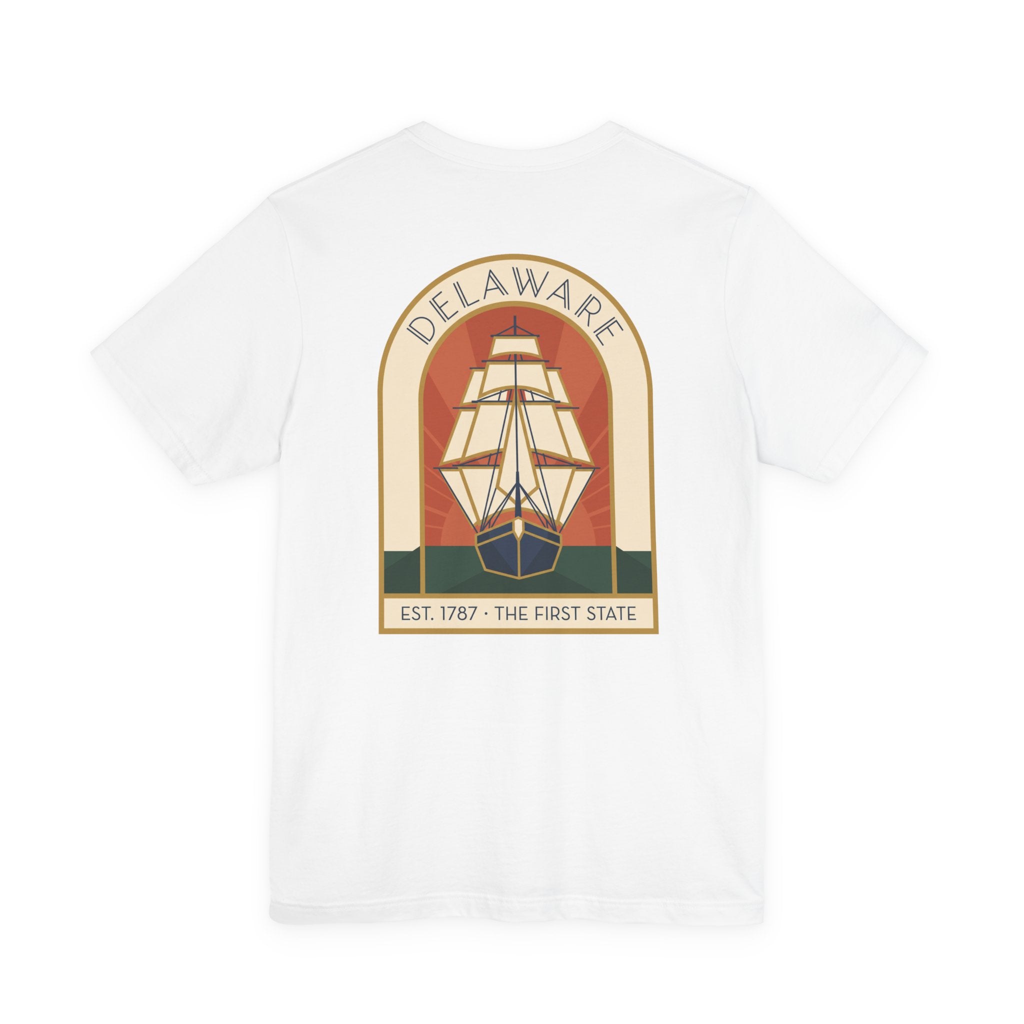 White t-shirt with large back graphic of a sailing ship inside a badge