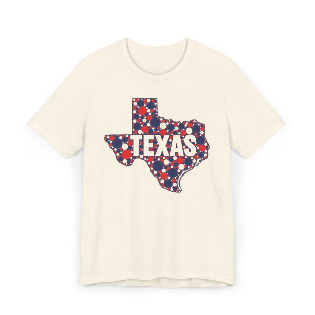 Cream T-shirt with polka dot Texas outline graphic in red, blue, and white