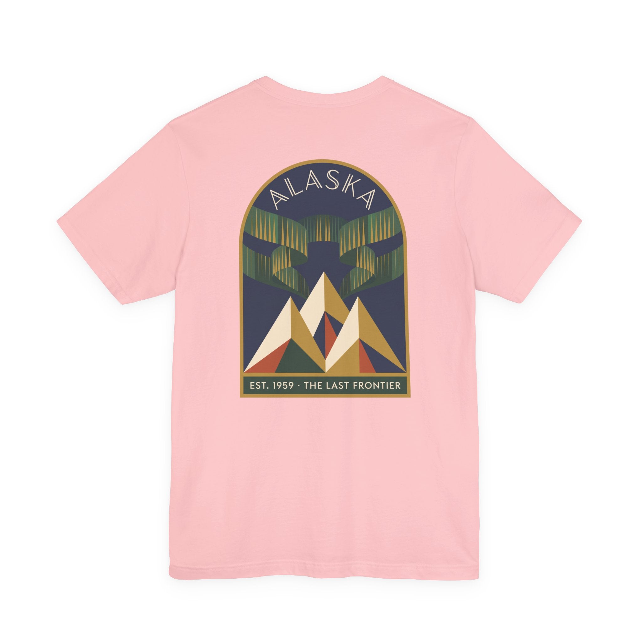 Pink T-shirt with circular Alaska graphic showing aurora lights and mountains