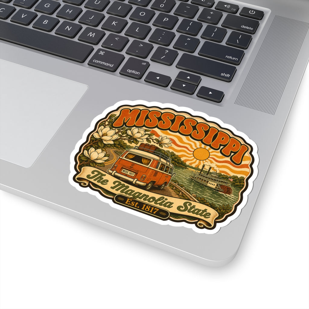 Mississippi retro state sticker on laptop, orange van and magnolia flowers in illustrated frame