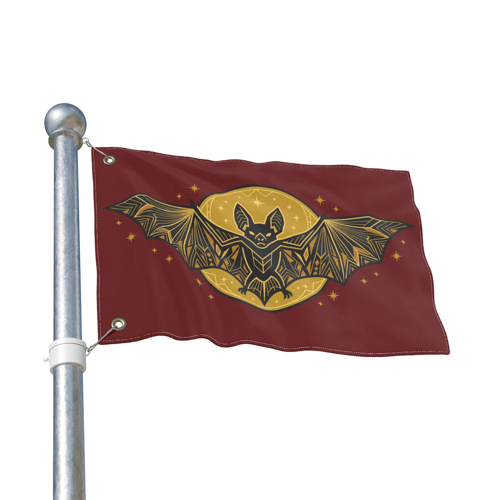 Burgundy bat moon outdoor flag with gold geometric bat and moon, mounted on metal pole