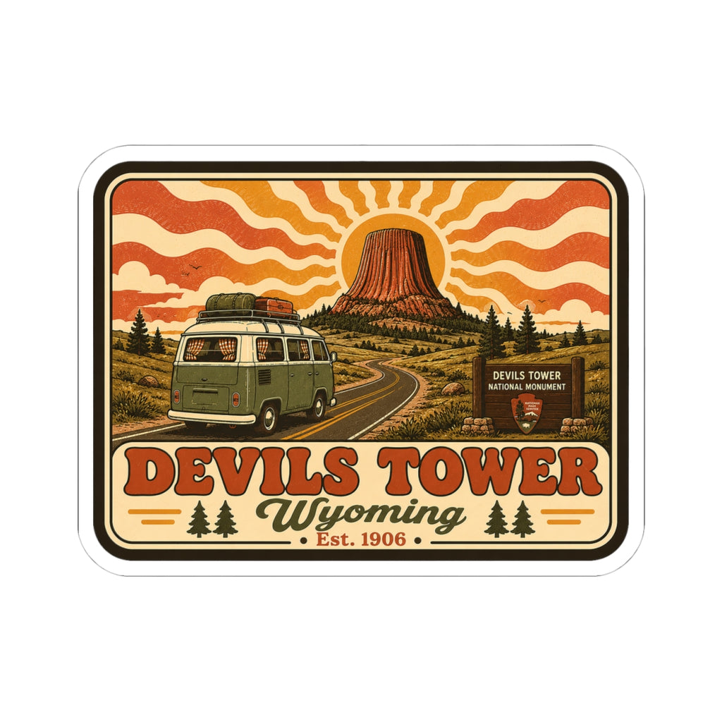 Kiss-cut sticker showing green camper van beside Devil’s Tower with “Wyoming” title
