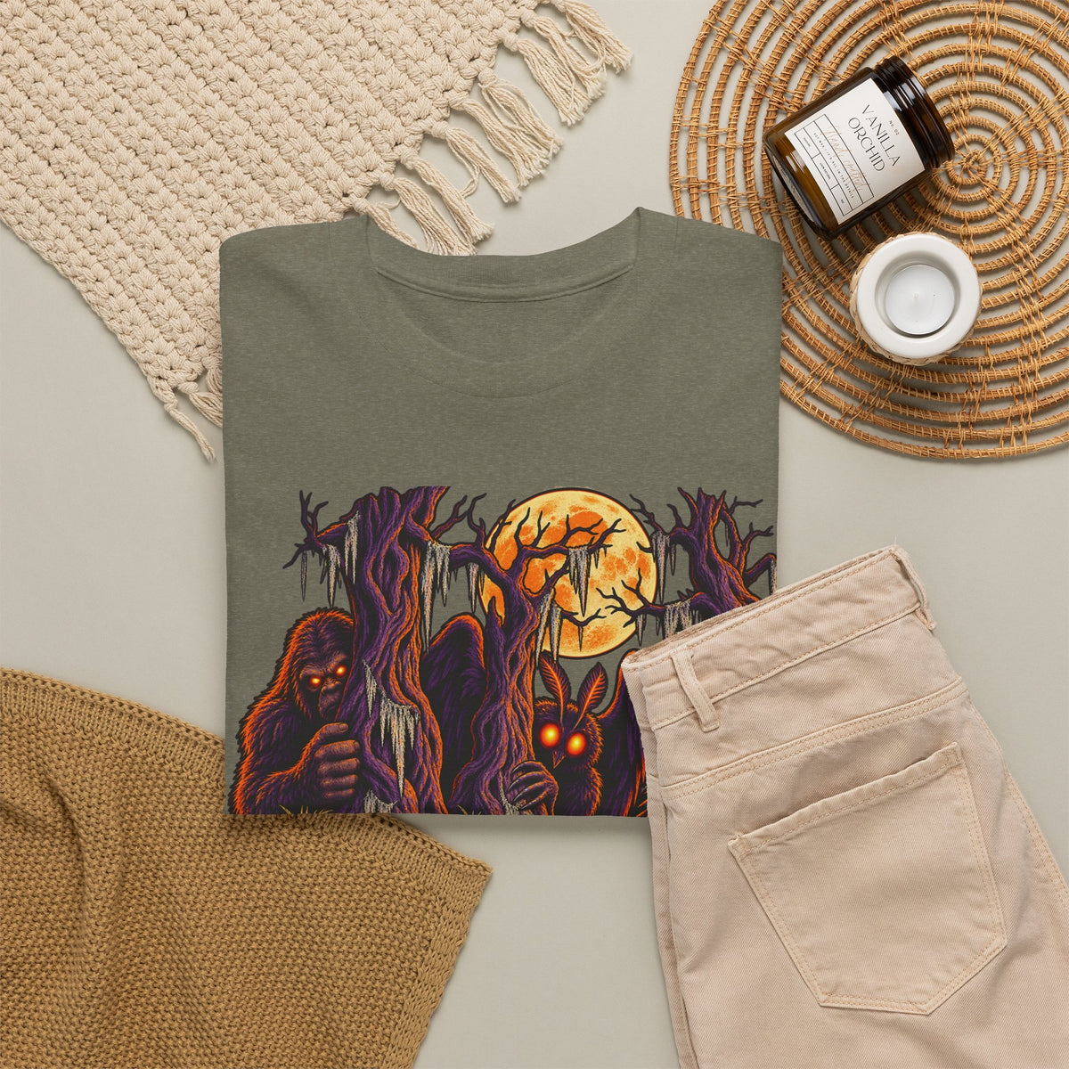 Dark olive green T-shirt with haunted monster and glowing moon graphic, crew neck.