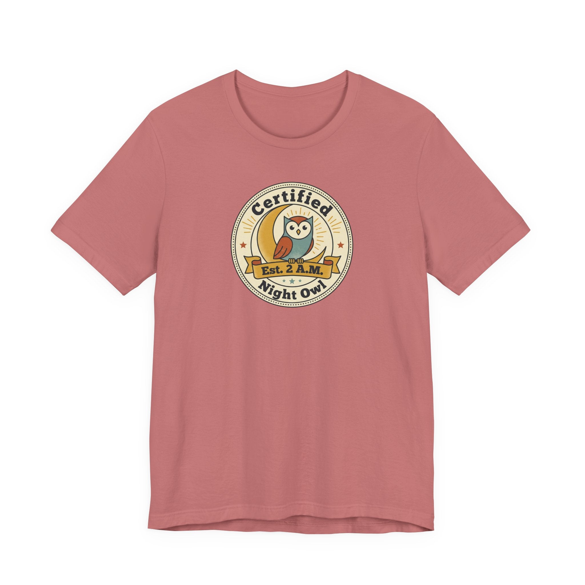 Dusty pink T-shirt with certified night owl badge graphic on chest