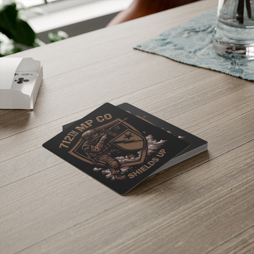 Poker cards with 712th MP Co Shields Up shield artwork on the card face