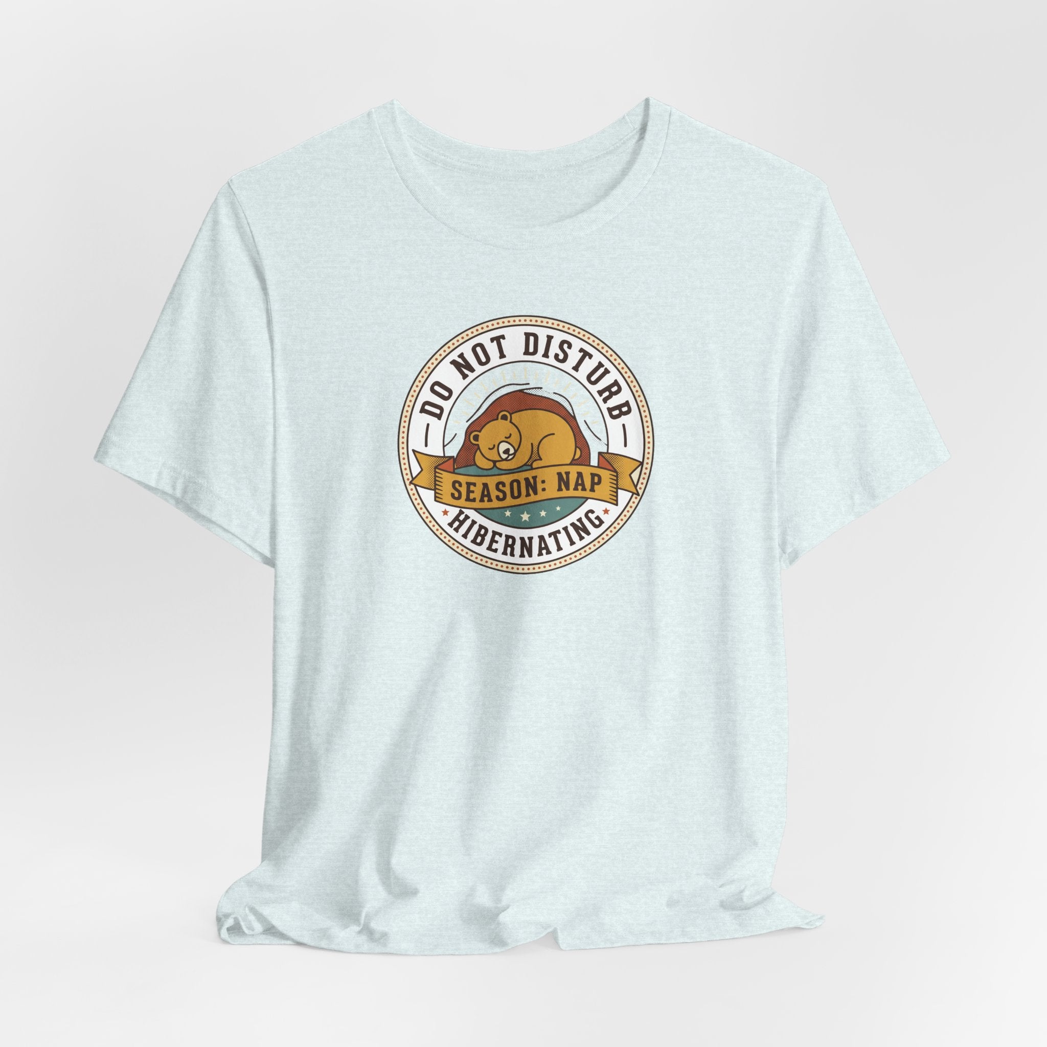 Do Not Disturb hibernating bear T-shirt, pale light blue with circular bear graphic on chest