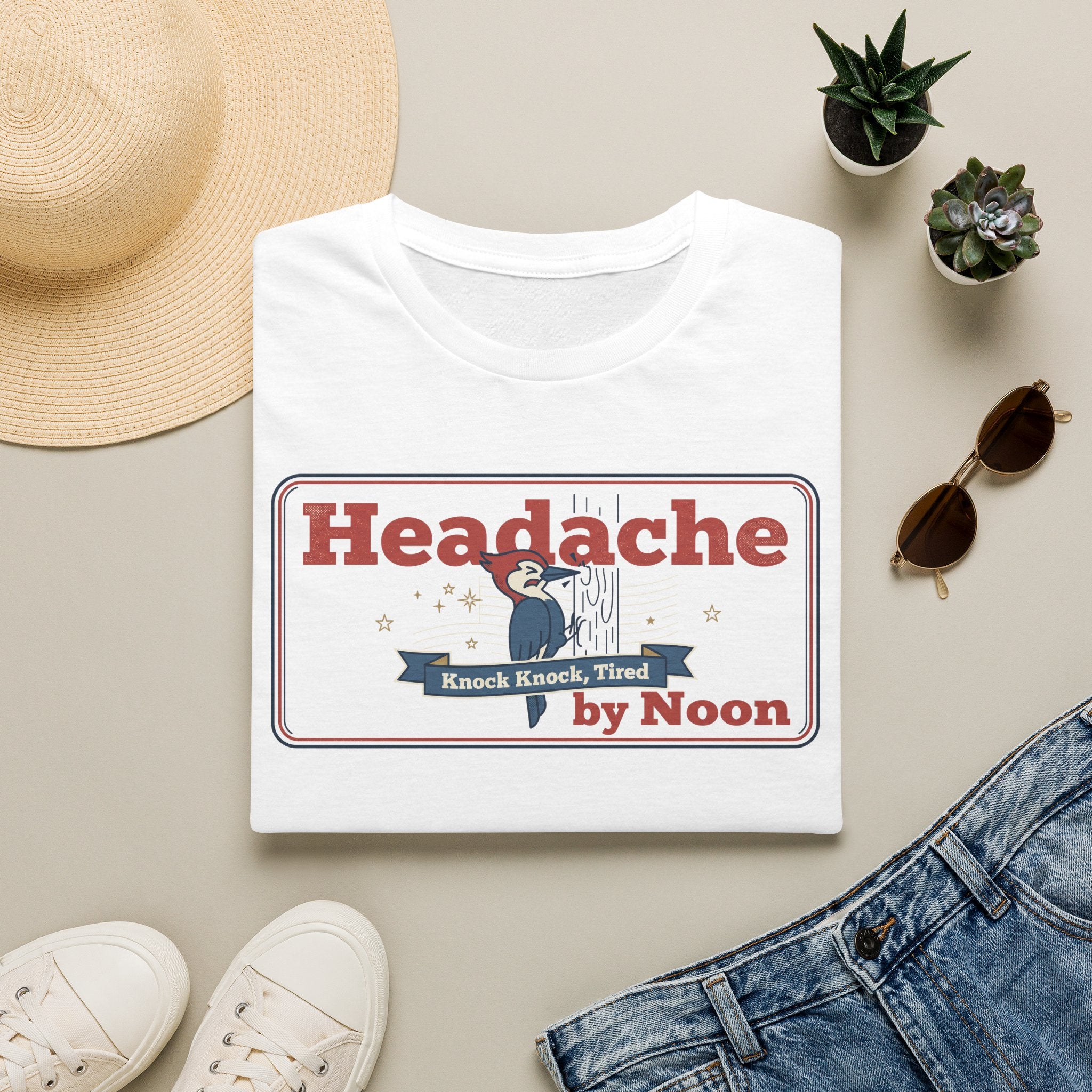 White T-shirt with large “Headache” graphic and banner text in red and blue