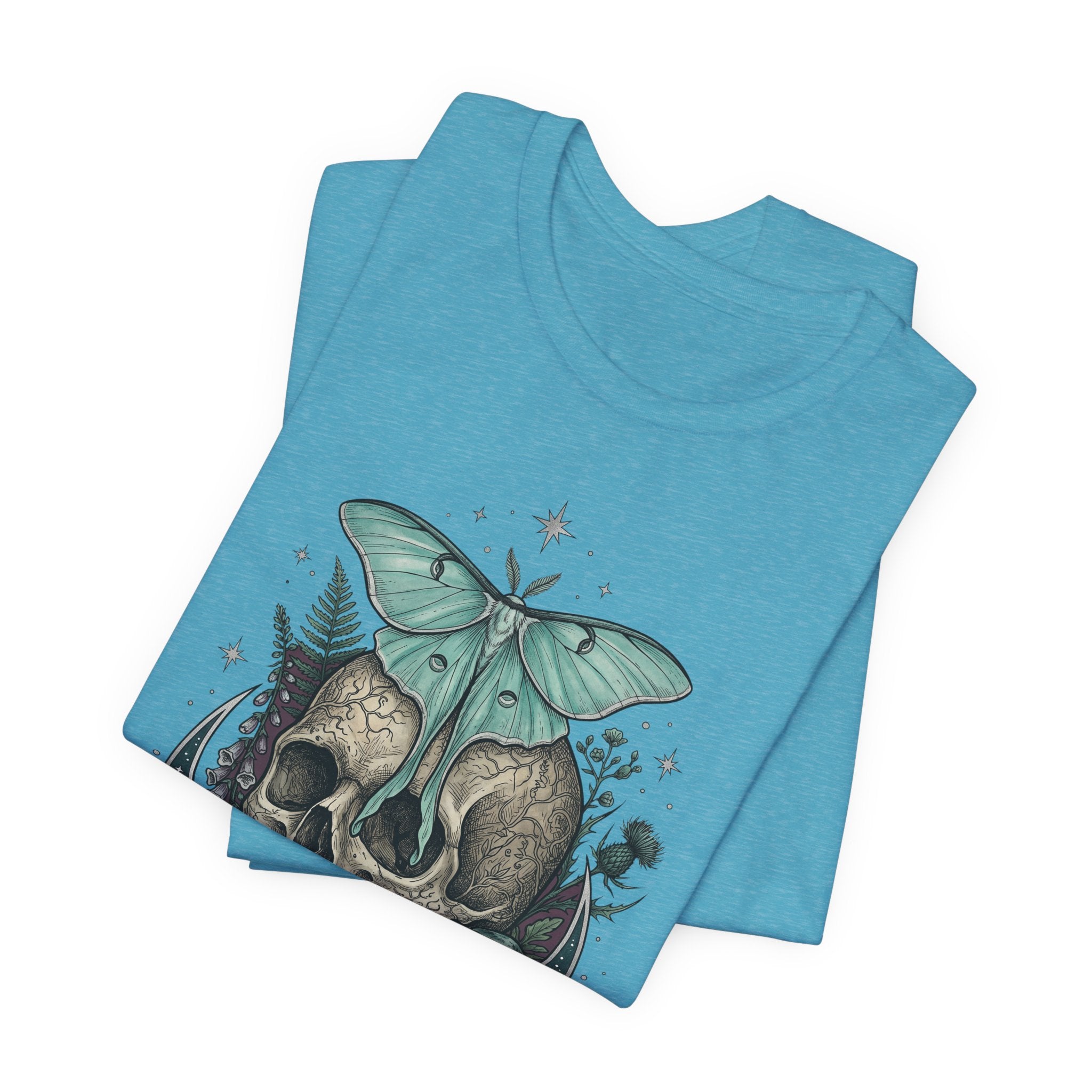 Light blue heather T-shirt with teal moth and skull illustration on the front