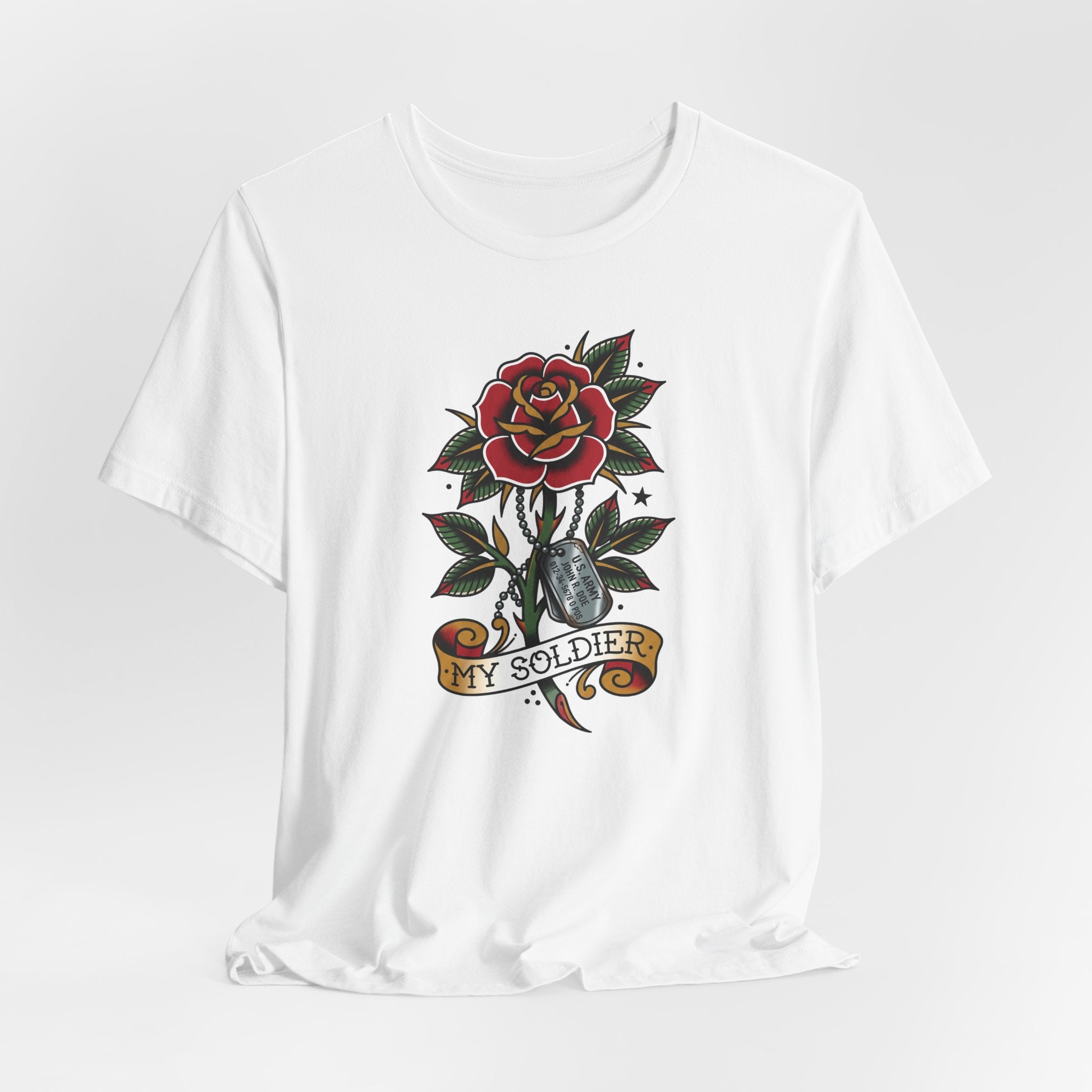 White T-shirt with rose and dog tag graphic, leaves and “My Soldier” banner at center